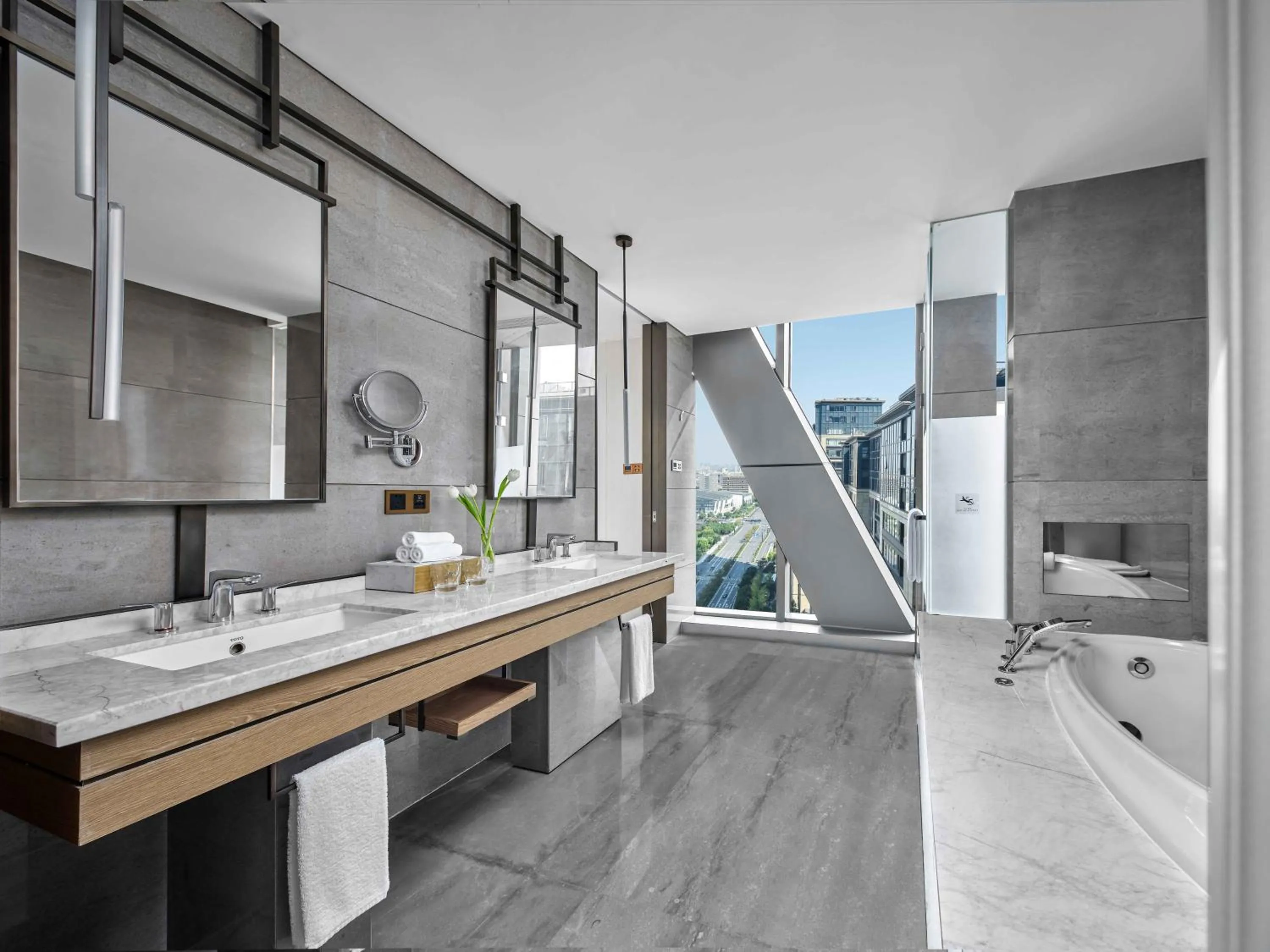 Bathroom in Vignette Collection Hangzhou Huaxia Center Hotel by IHG