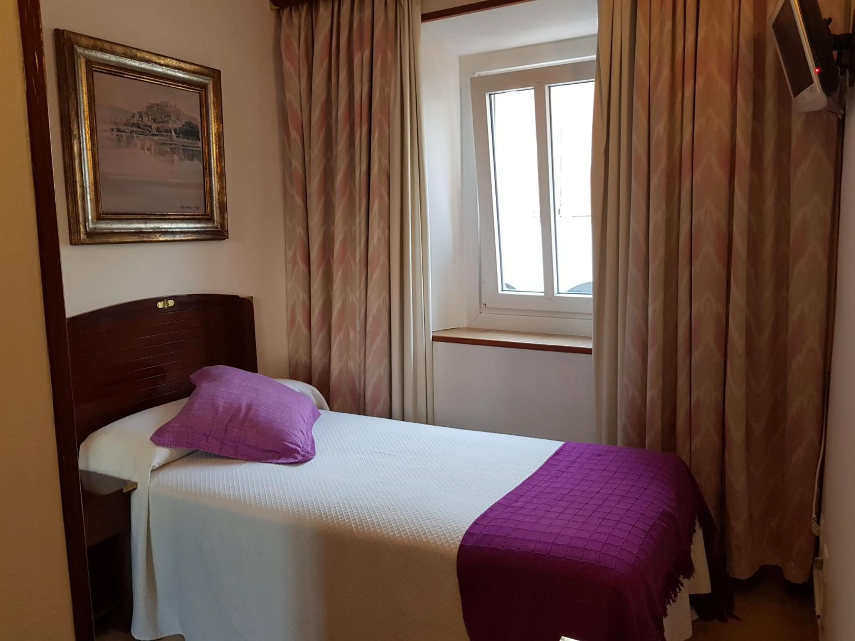 Bed in Hotel La Residencia