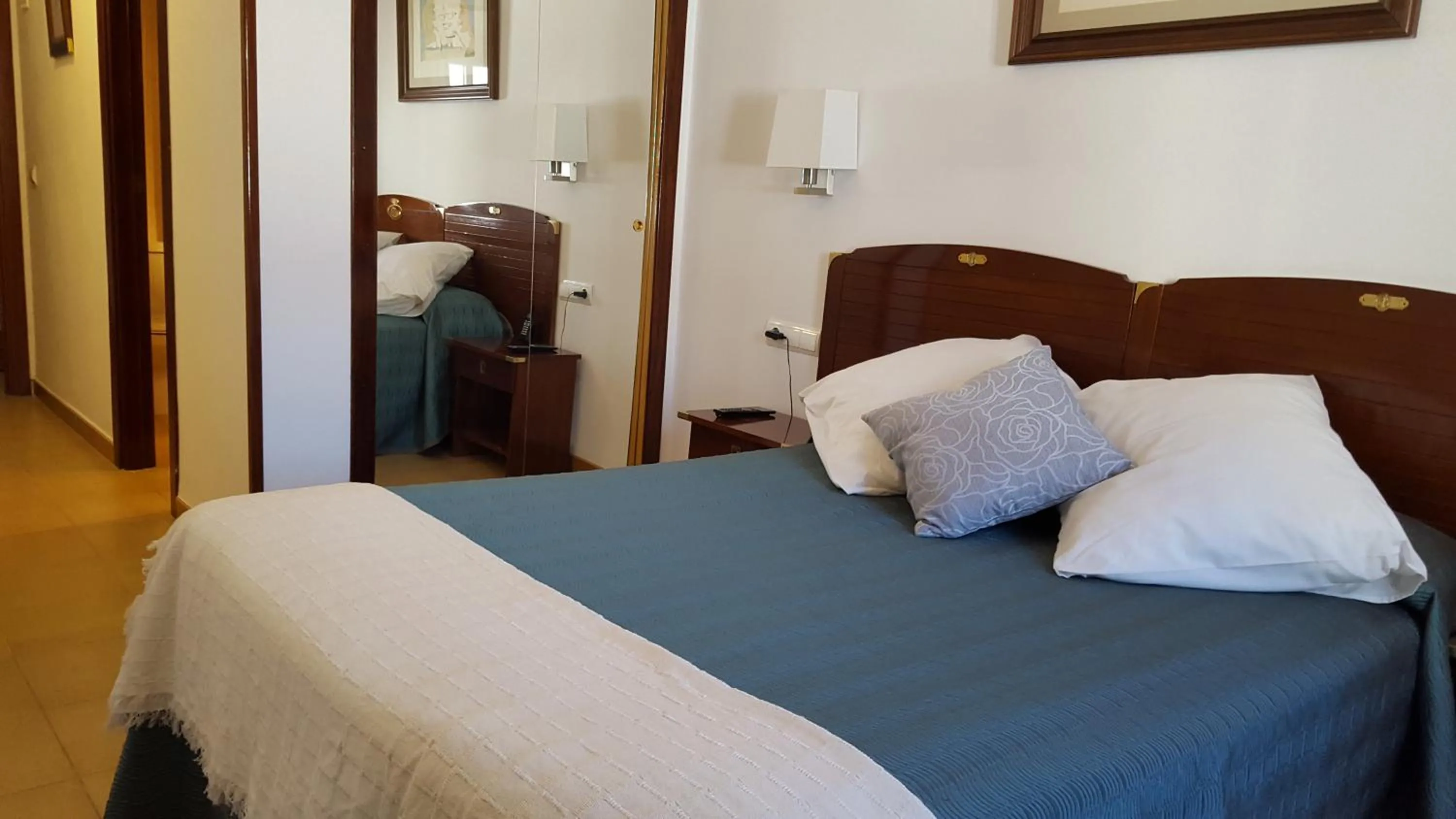 Bed in Hotel La Residencia