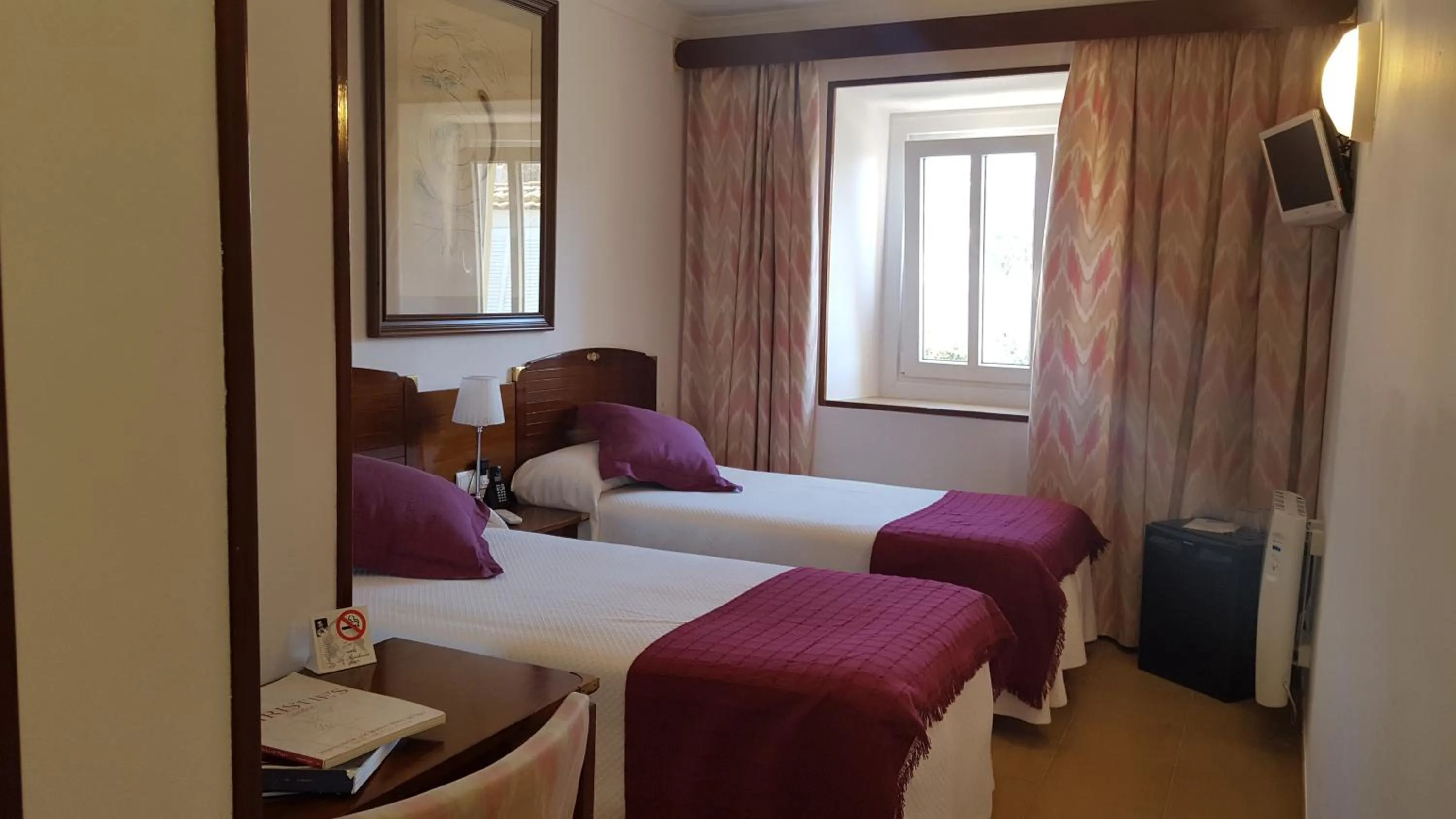 Bed in Hotel La Residencia