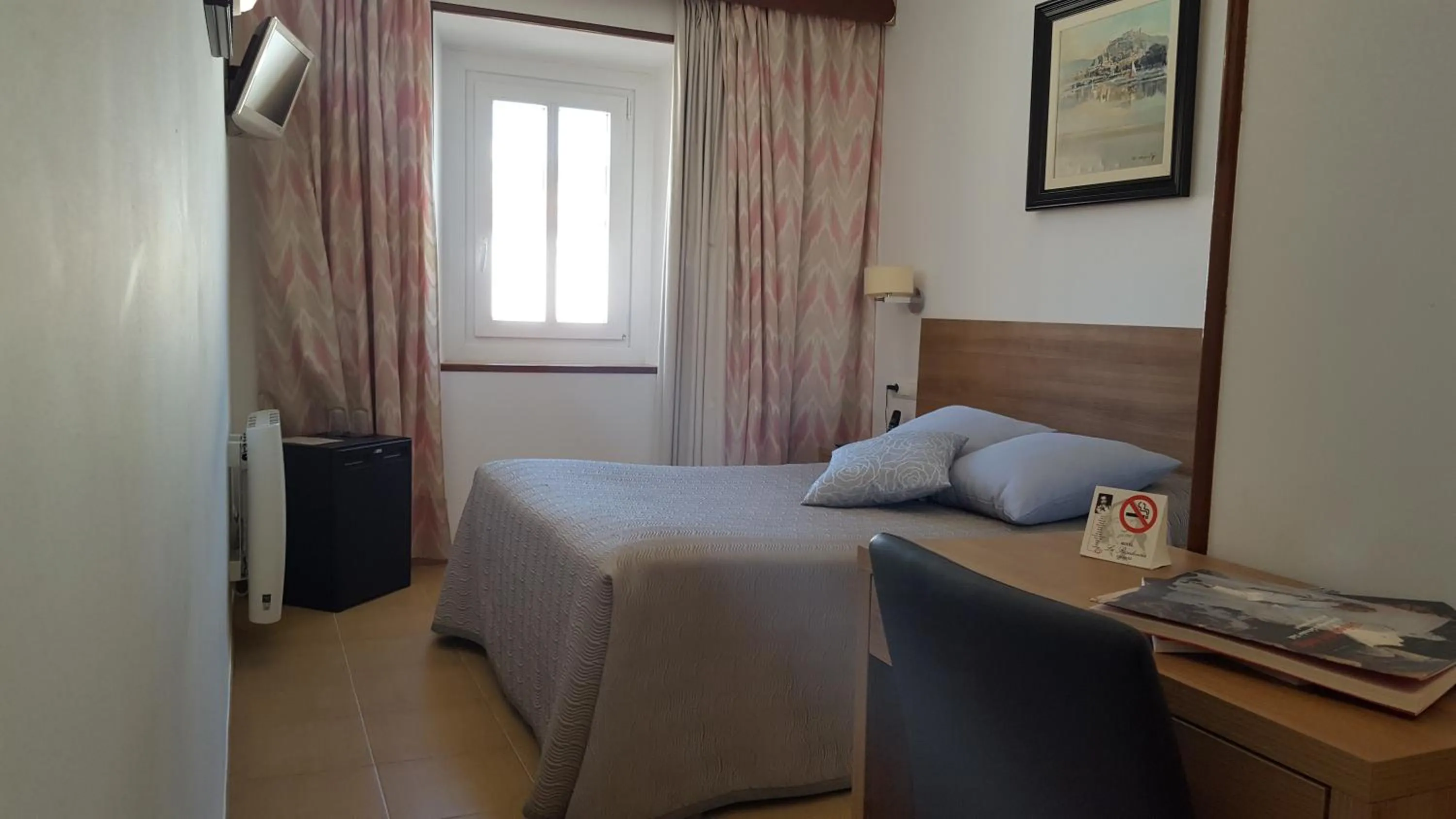Bed in Hotel La Residencia
