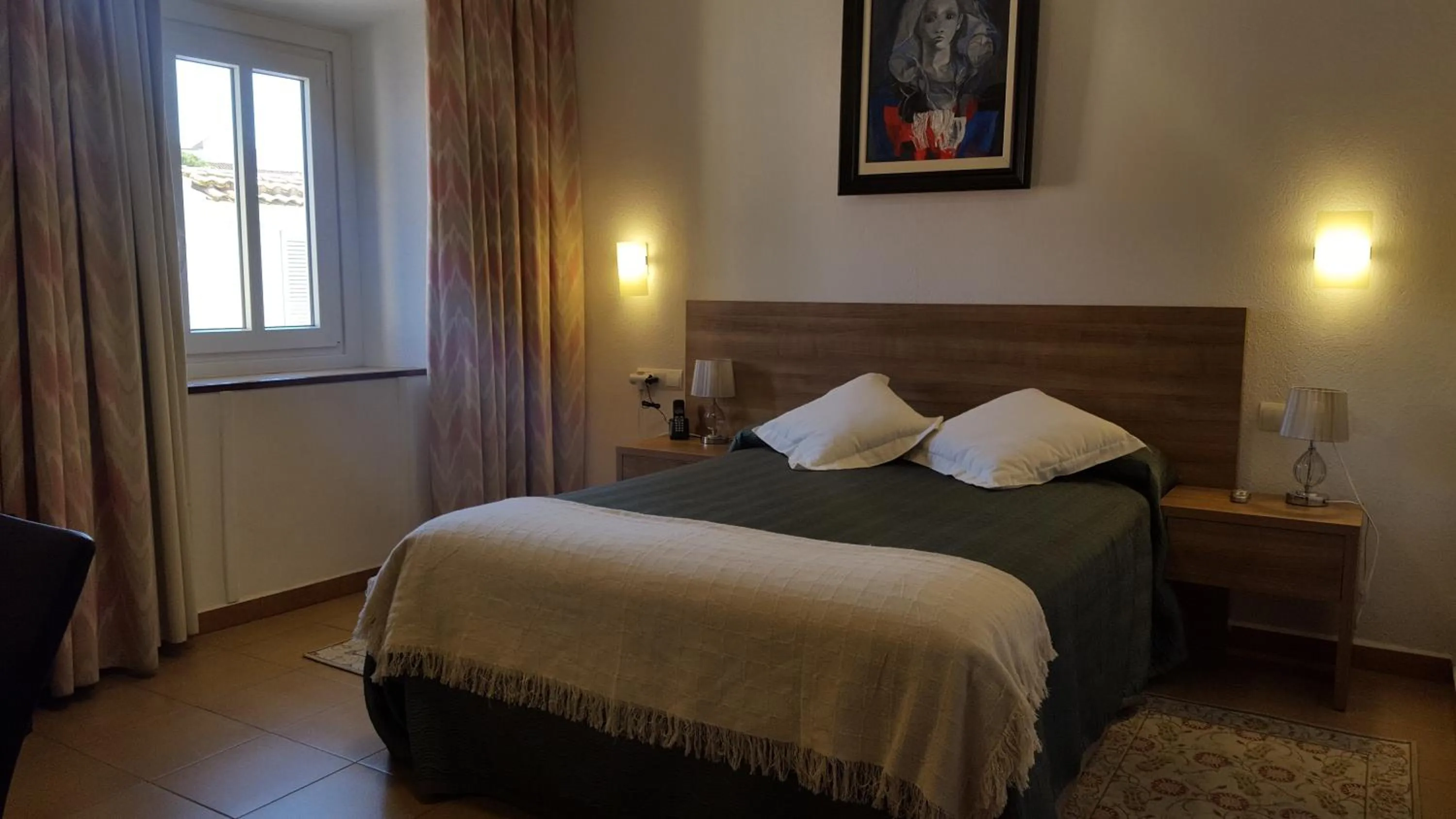 Bed in Hotel La Residencia