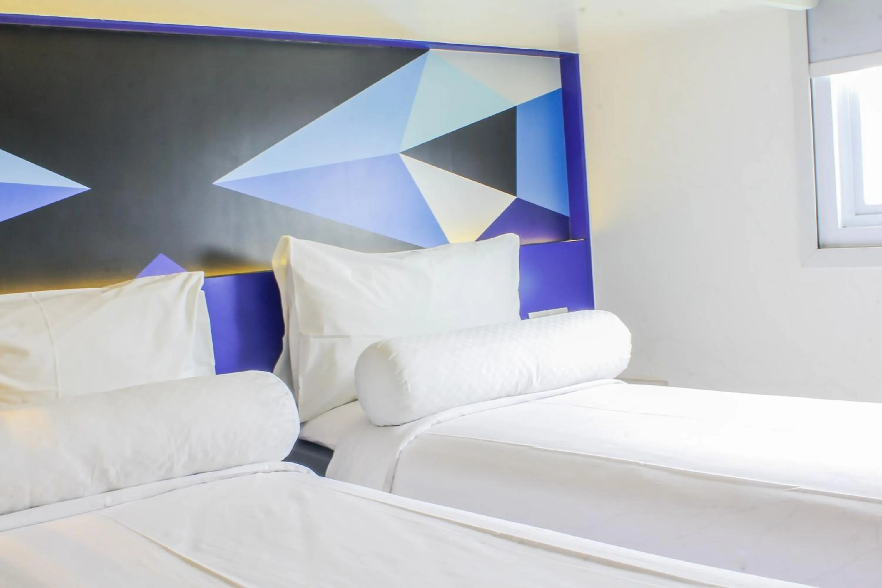 Bed in MD 7 Hotel Cirebon