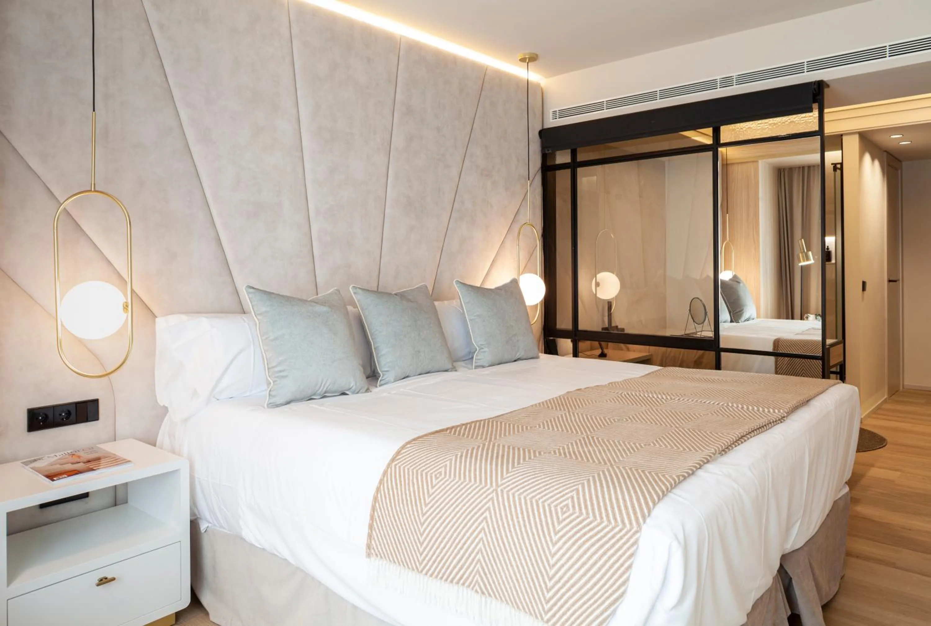 Bed in Nivia Born Boutique Hotel