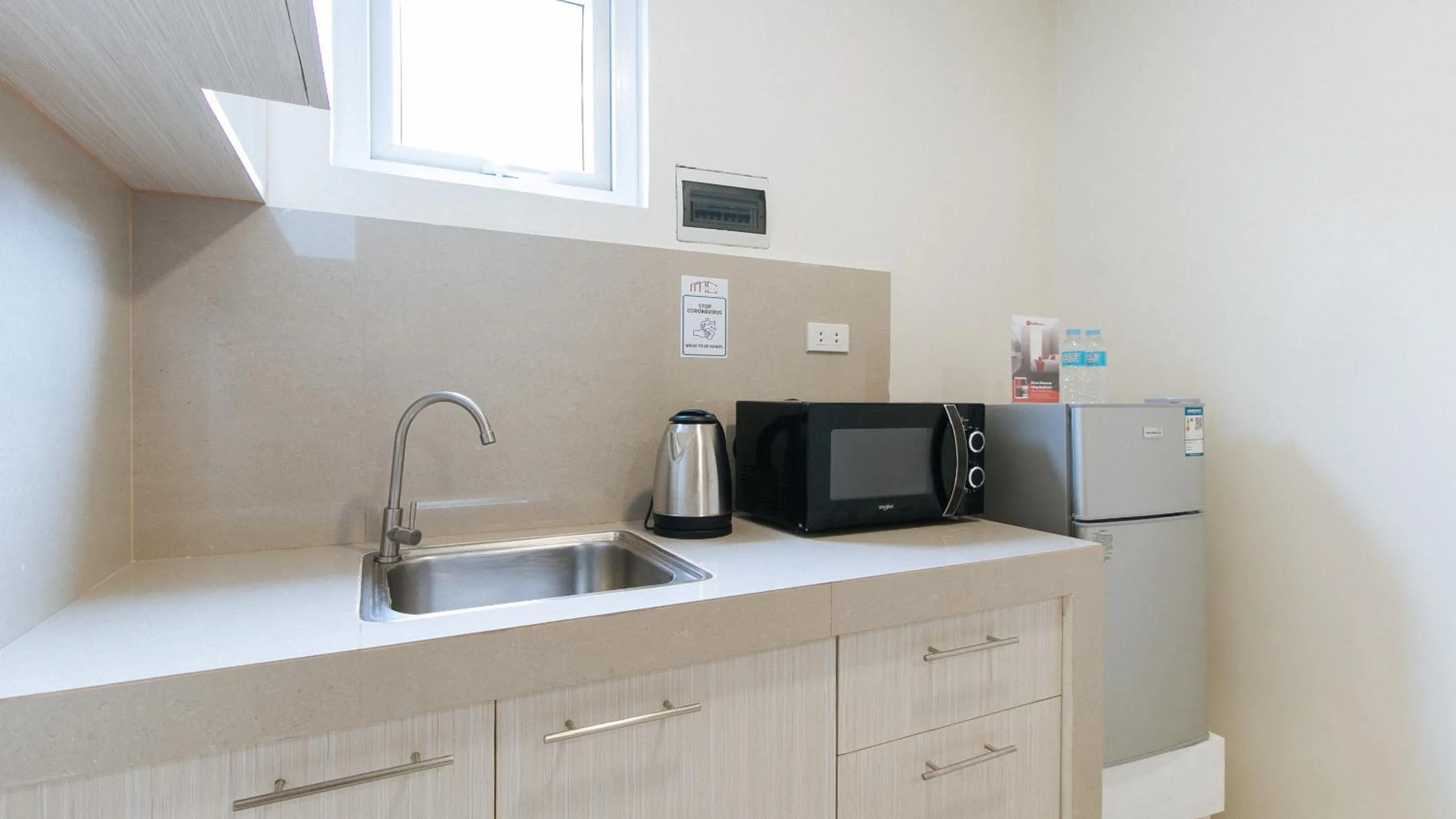 Kitchen or kitchenette in RedDoorz near Fernwoods Garden Quezon City