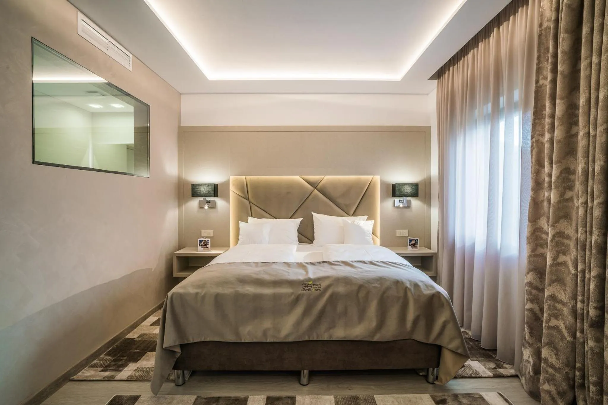 Bed in Hotel Eden Garden Spa