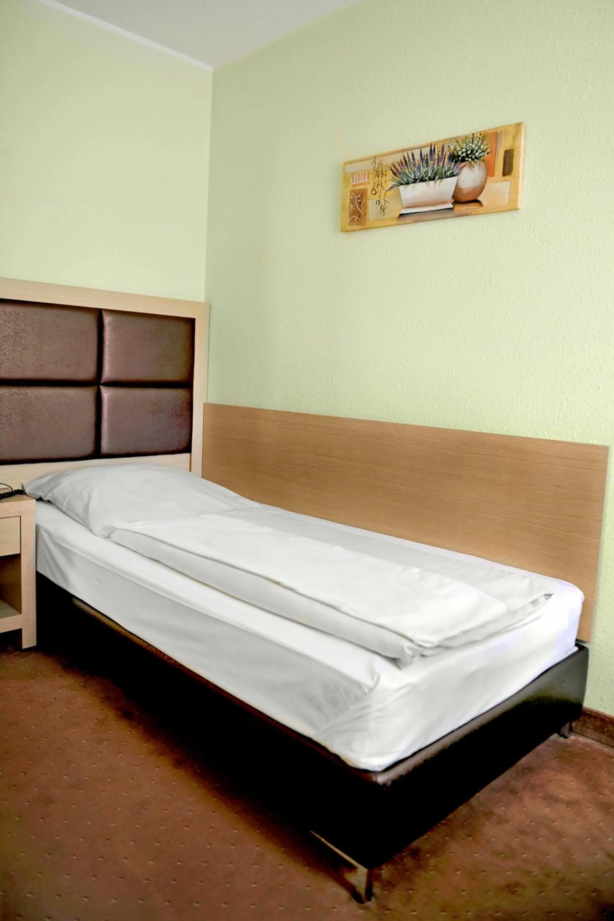 Bed in Hotel Tannenhof