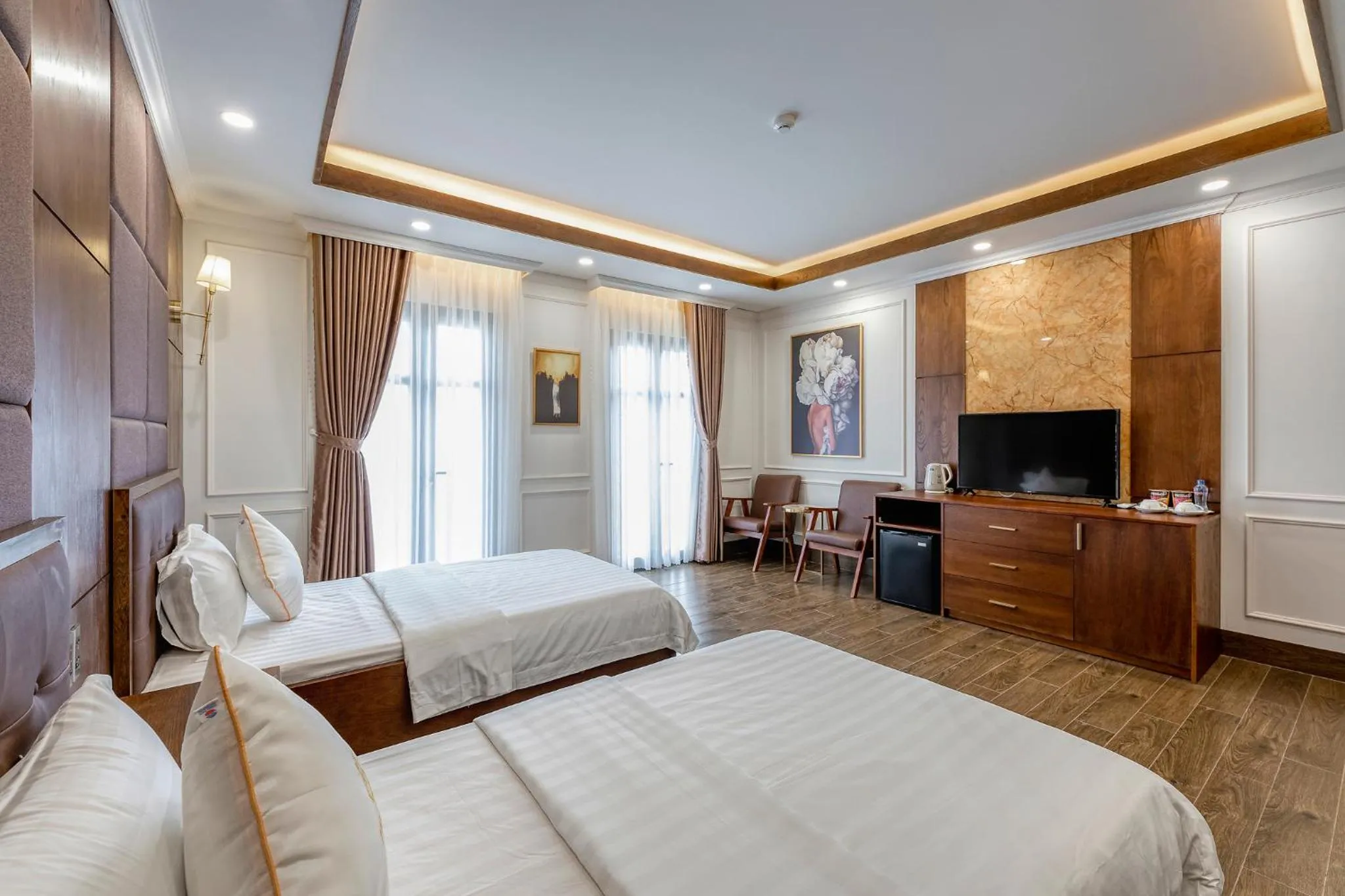 Communal lounge/ TV room, Bed in Hotel Trí Lê