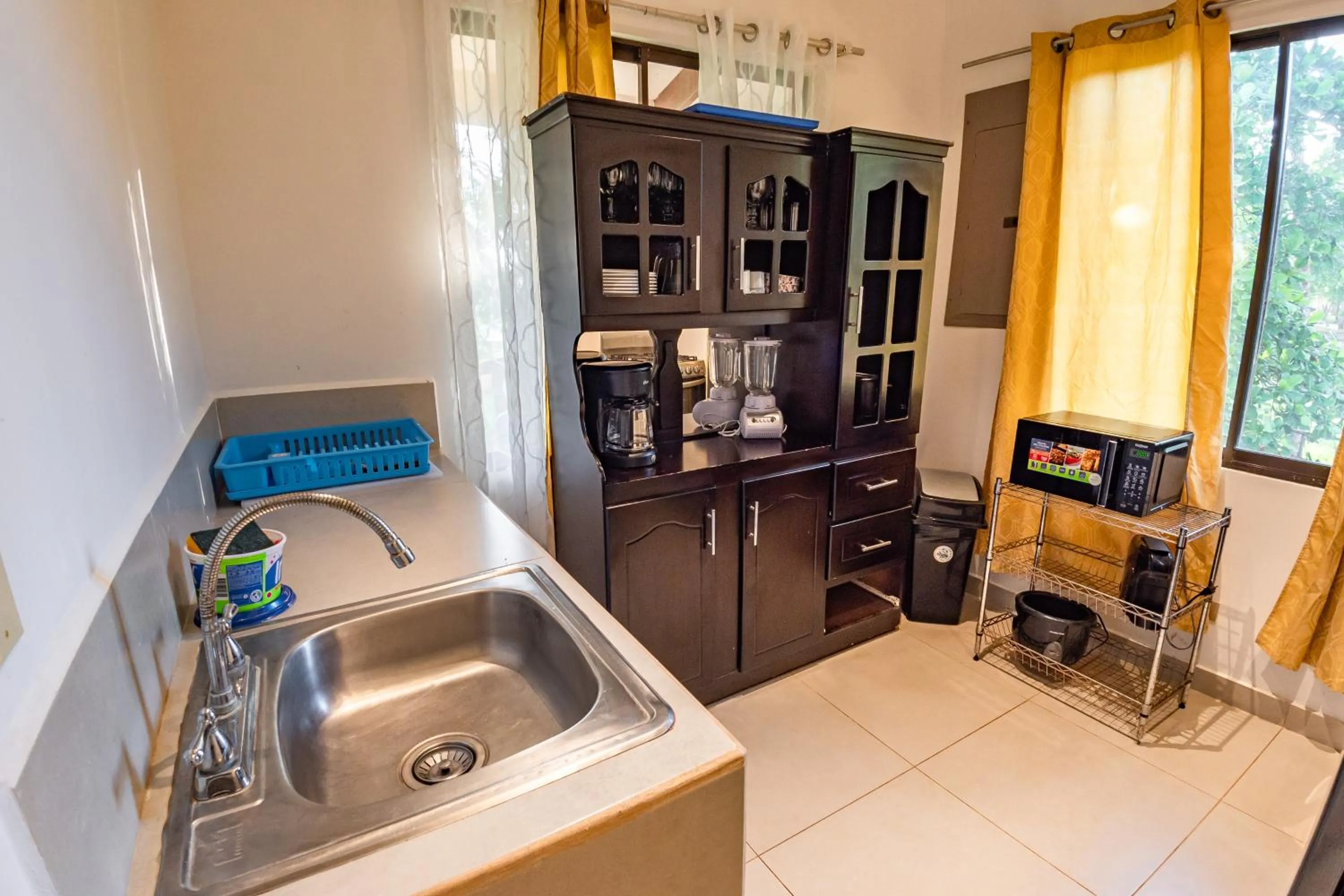 Kitchen or kitchenette in Sunset del Mar Beach Resort