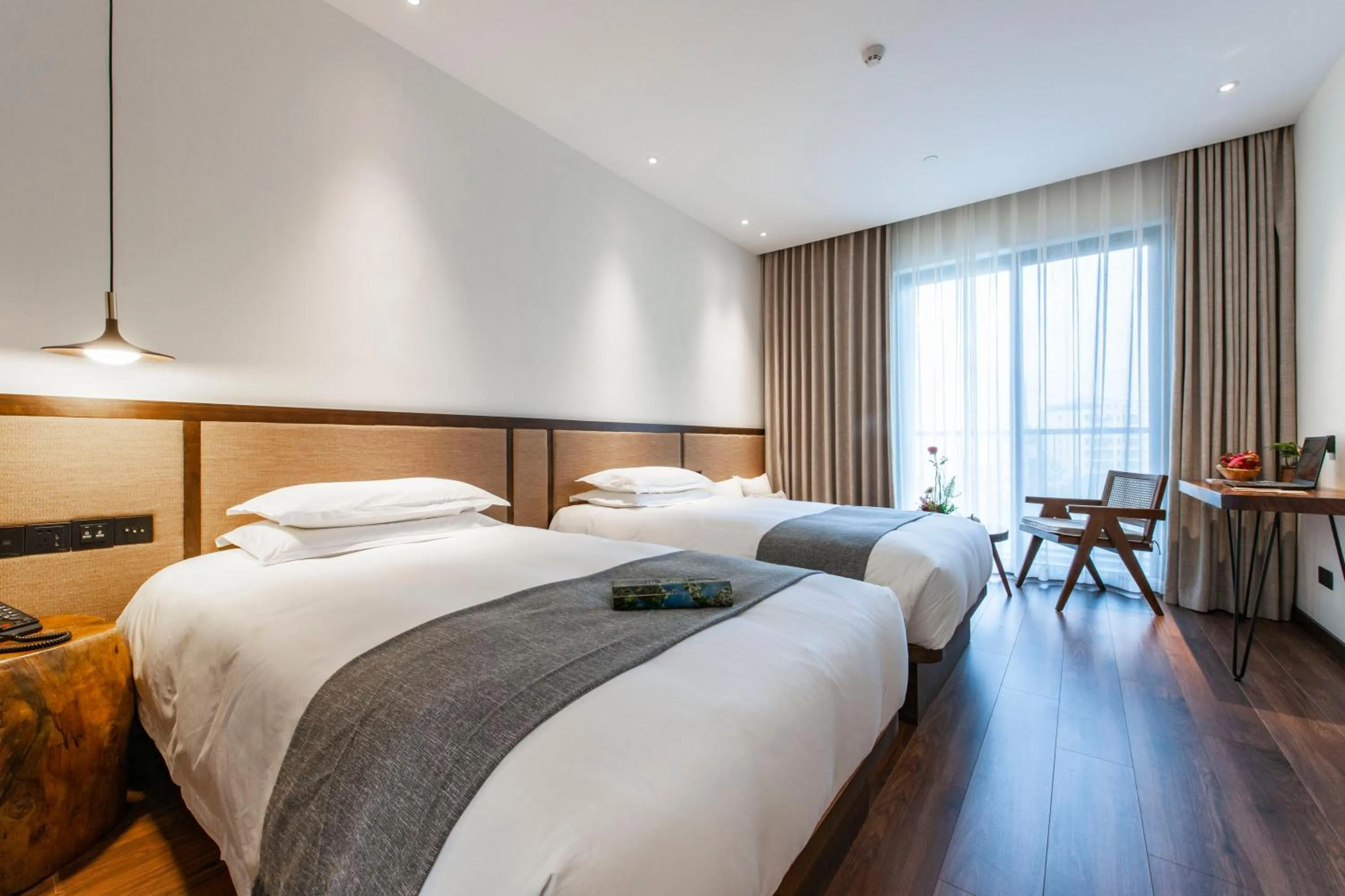 Bed in SSAW Boutique Hotel Hangzhou Liangyun
