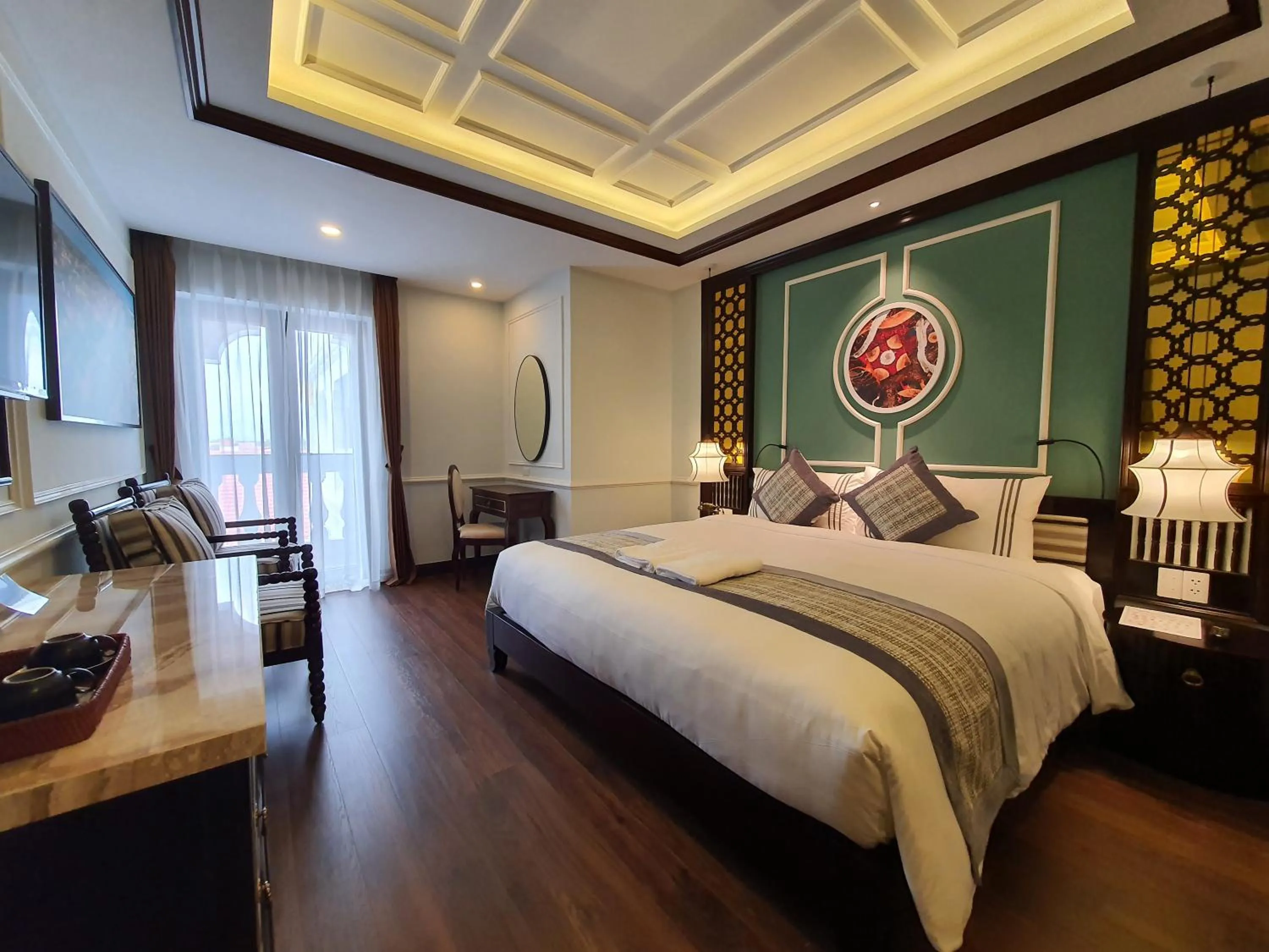 Bed in Le Pavillon Hoi An Gallery Hotel & Spa