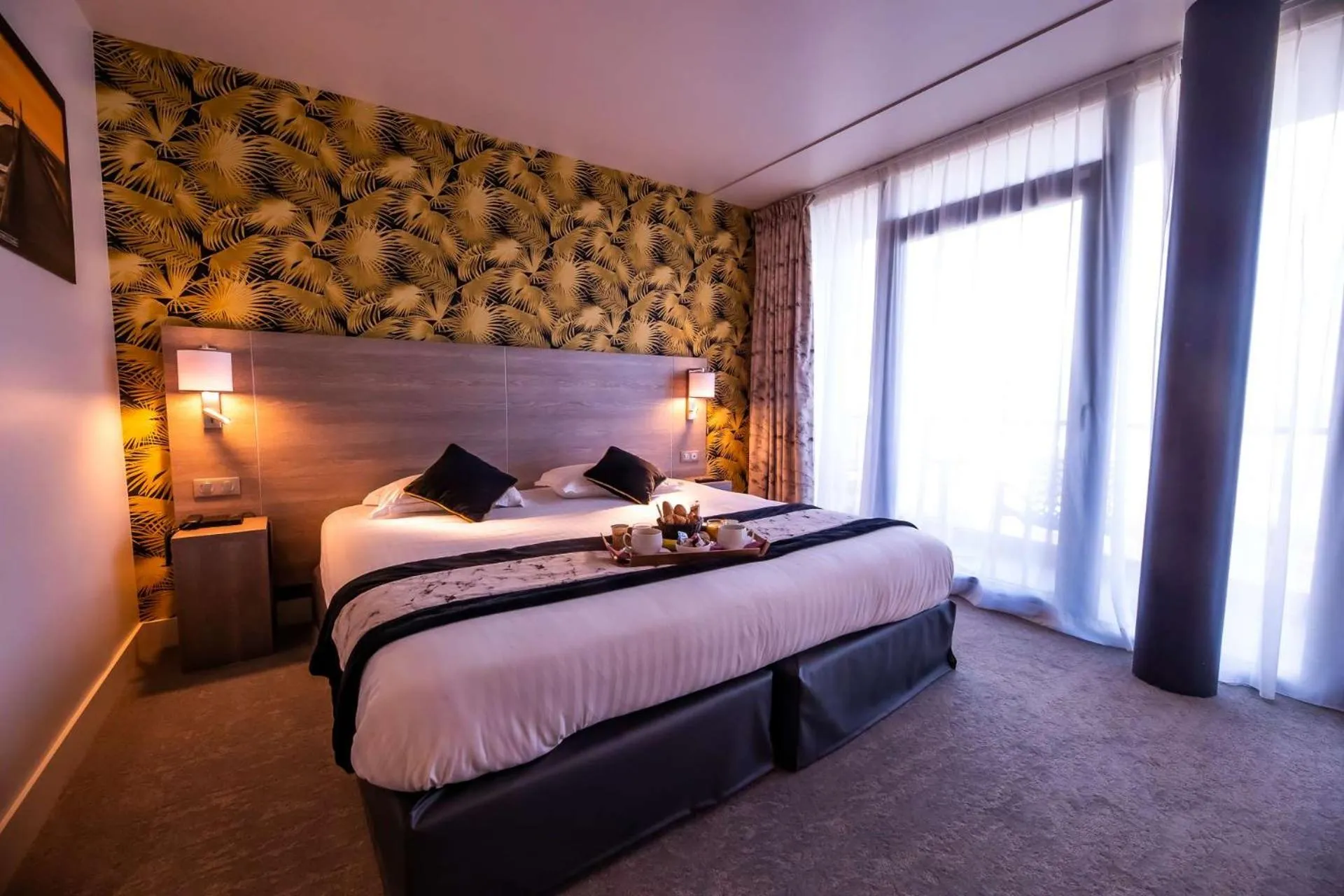 Bedroom, Bed in Brit Hotel Eden SPA Honfleur