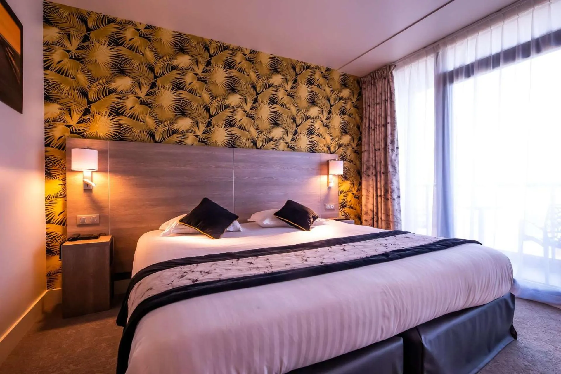 Bedroom, Bed in Brit Hotel Eden SPA Honfleur