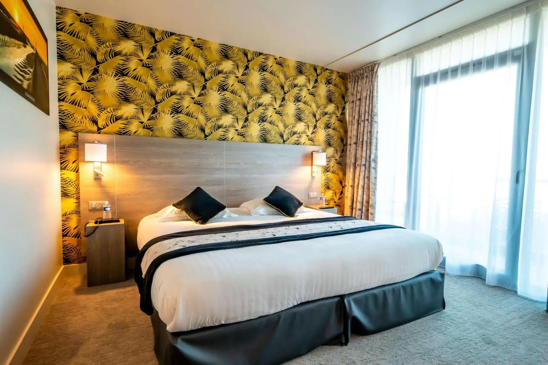 Bedroom, Bed in Brit Hotel Eden SPA Honfleur