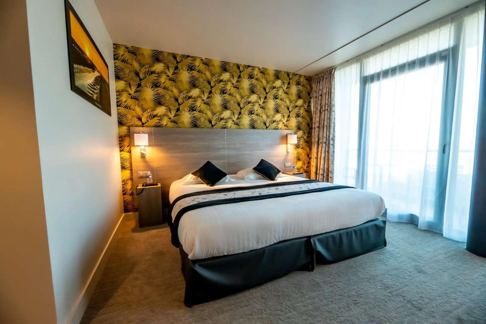 Bedroom, Bed in Brit Hotel Eden SPA Honfleur