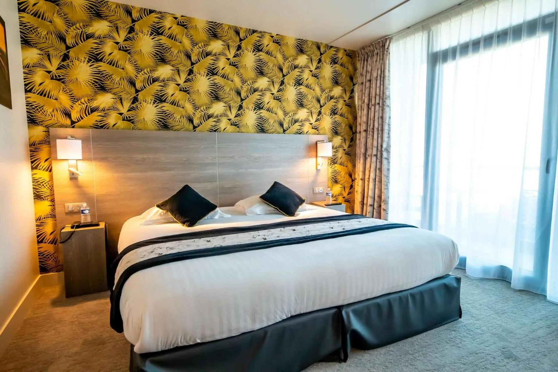 Bedroom, Bed in Brit Hotel Eden SPA Honfleur