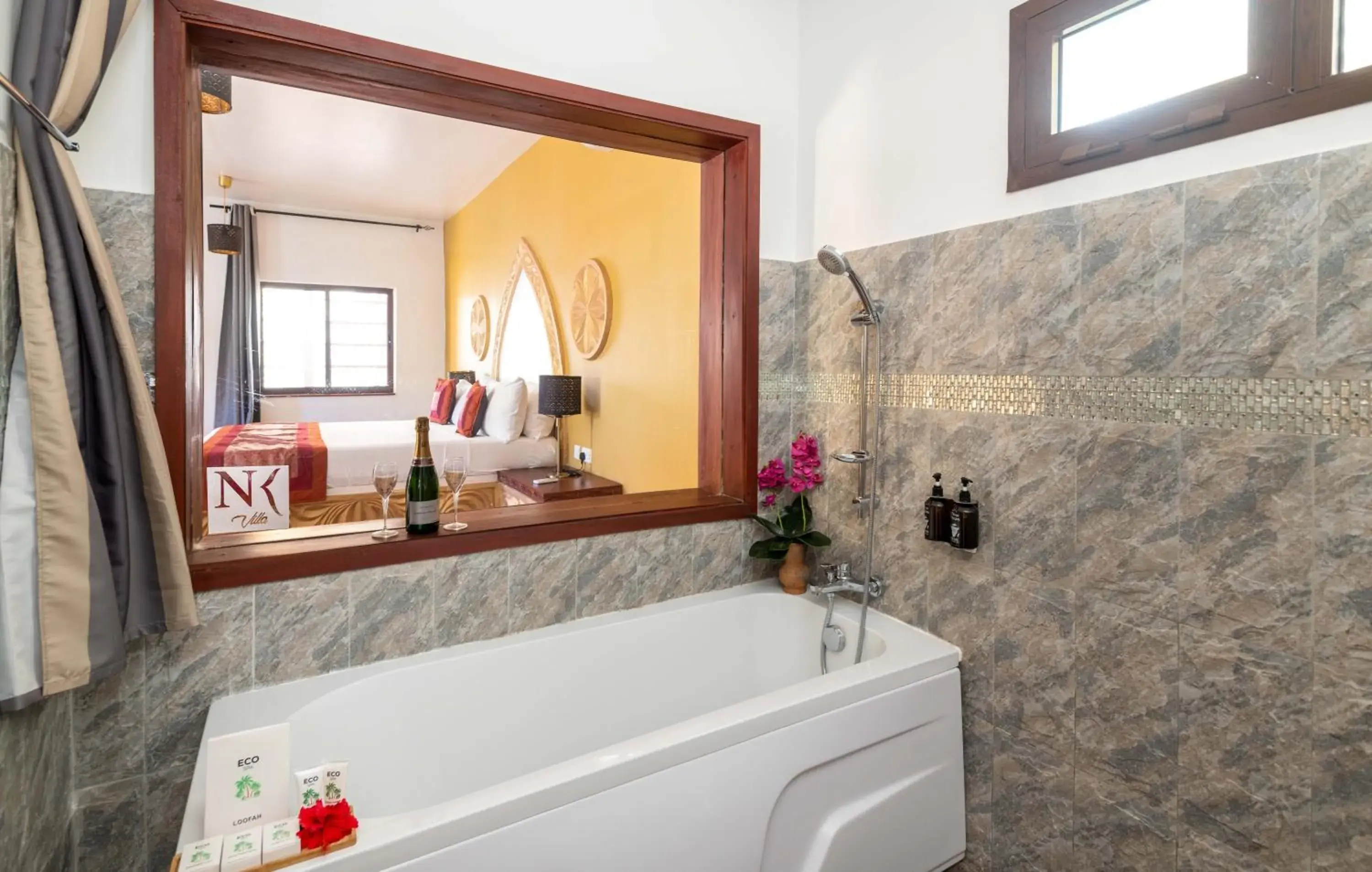 Deluxe Quadruple Room - single occupancy in Kibanda Natural Kendwa Villa Deluxe Quadruple Room - single occupancy in Kibanda Natural Kendwa Villa