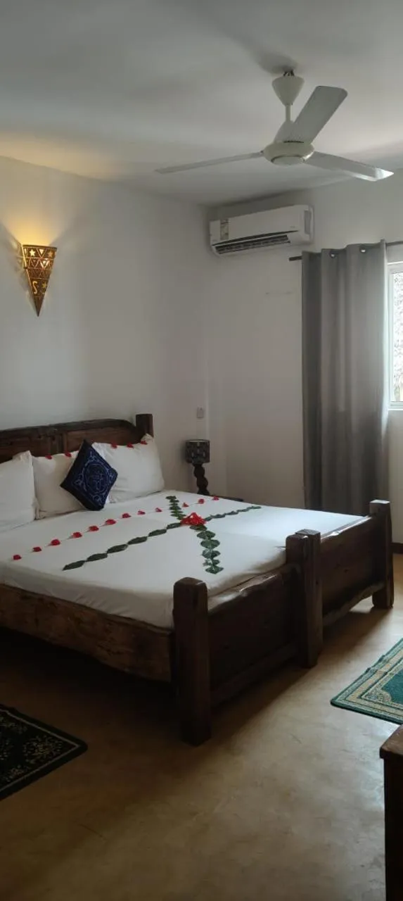 Bed in Kibanda Natural Kendwa Villa