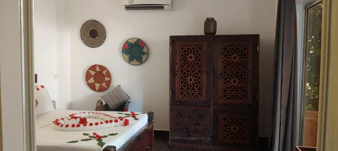 Bed in Kibanda Natural Kendwa Villa