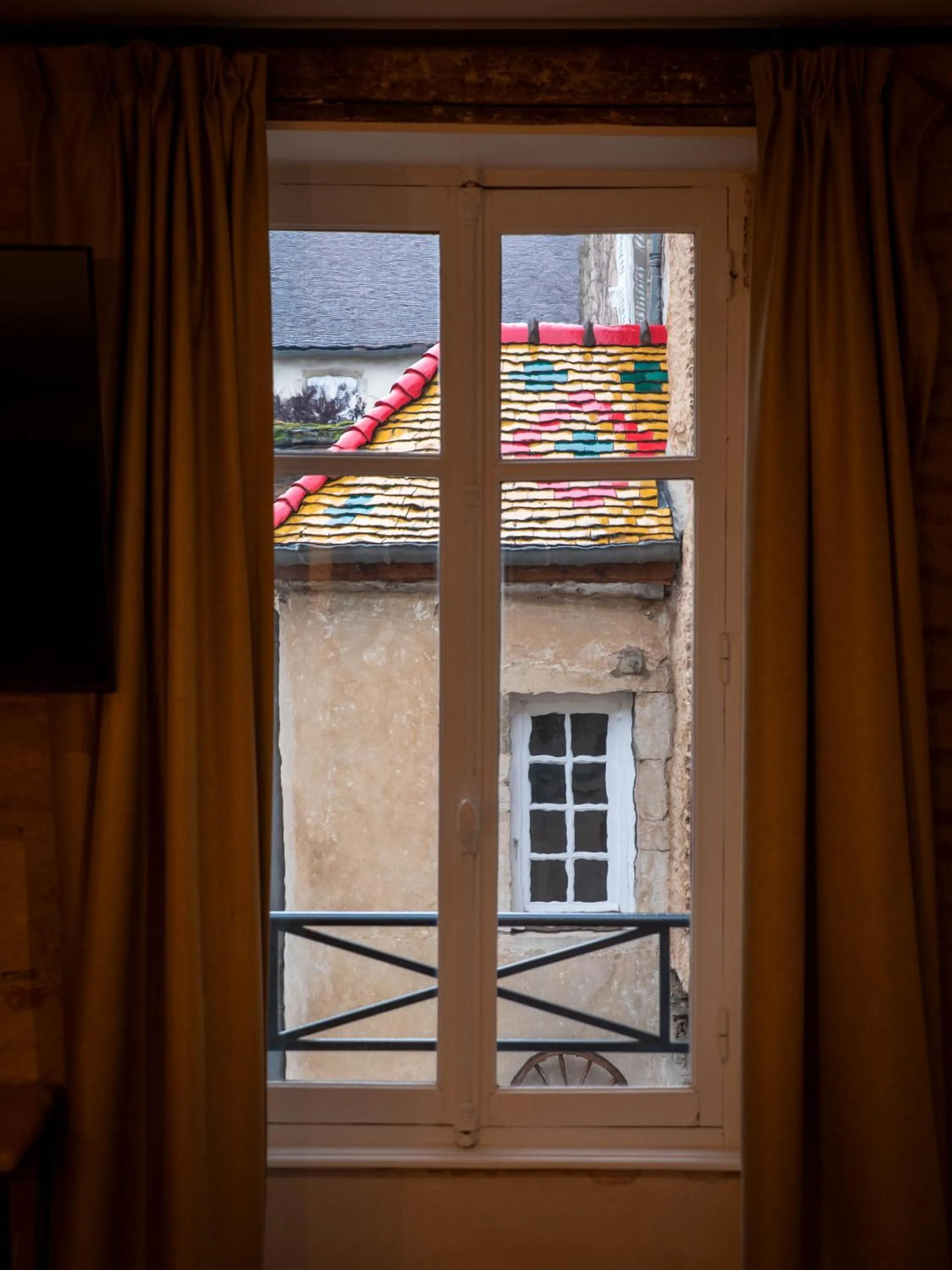 Garden view in Les Remparts Hôtels et Demeures Historiques