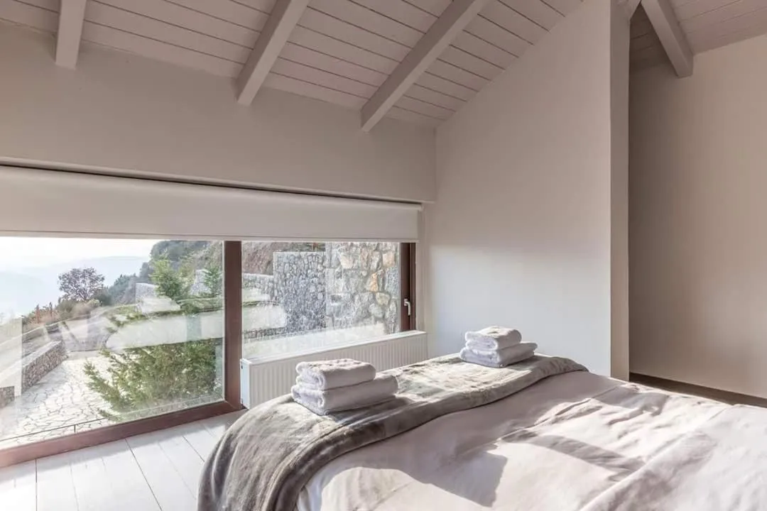 Bed in Deluxe Villa by White Hills Outdoor Hot Tub