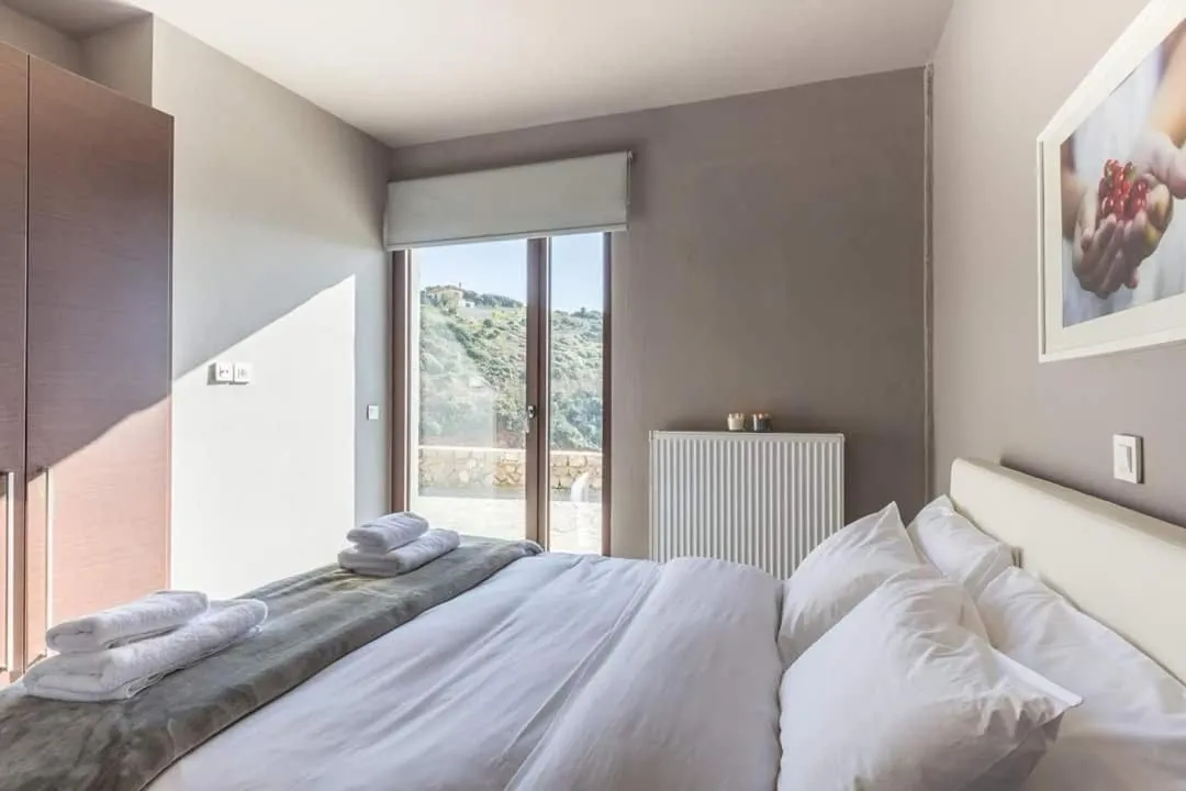 Bed in Deluxe Villa by White Hills Outdoor Hot Tub
