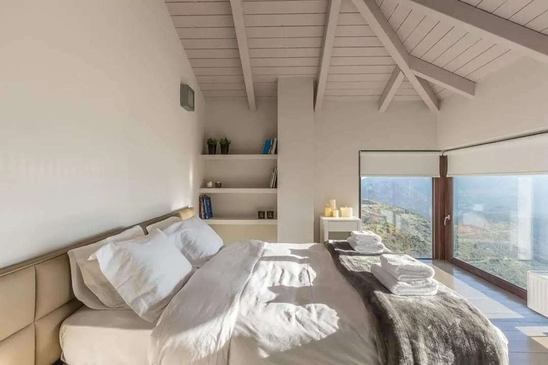 Bed in Deluxe Villa by White Hills Outdoor Hot Tub