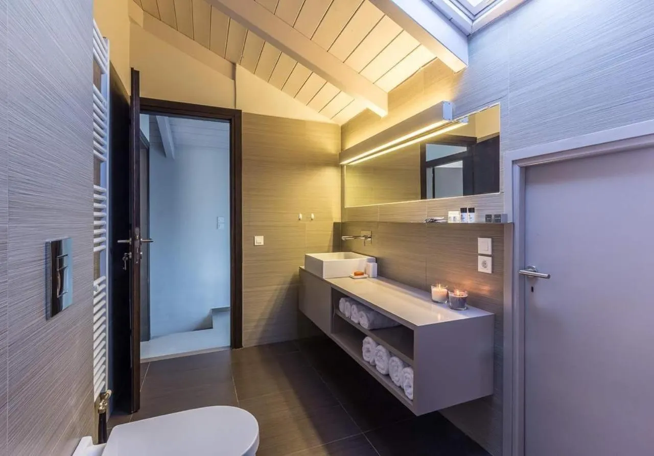 Bed in Deluxe Villa by White Hills Outdoor Hot Tub