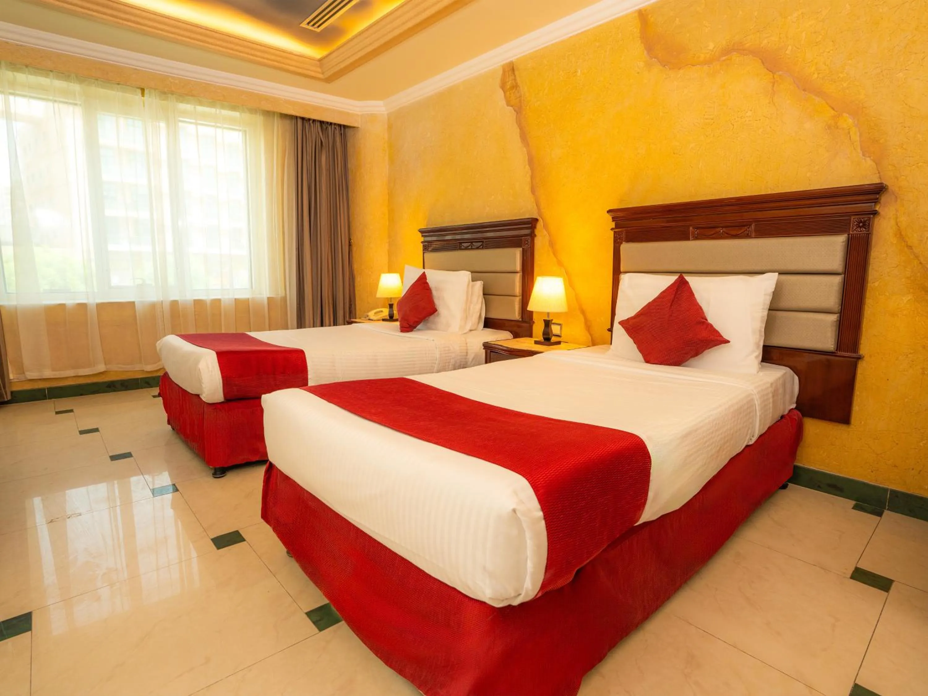 Bed in Oriental Hotel Apartments