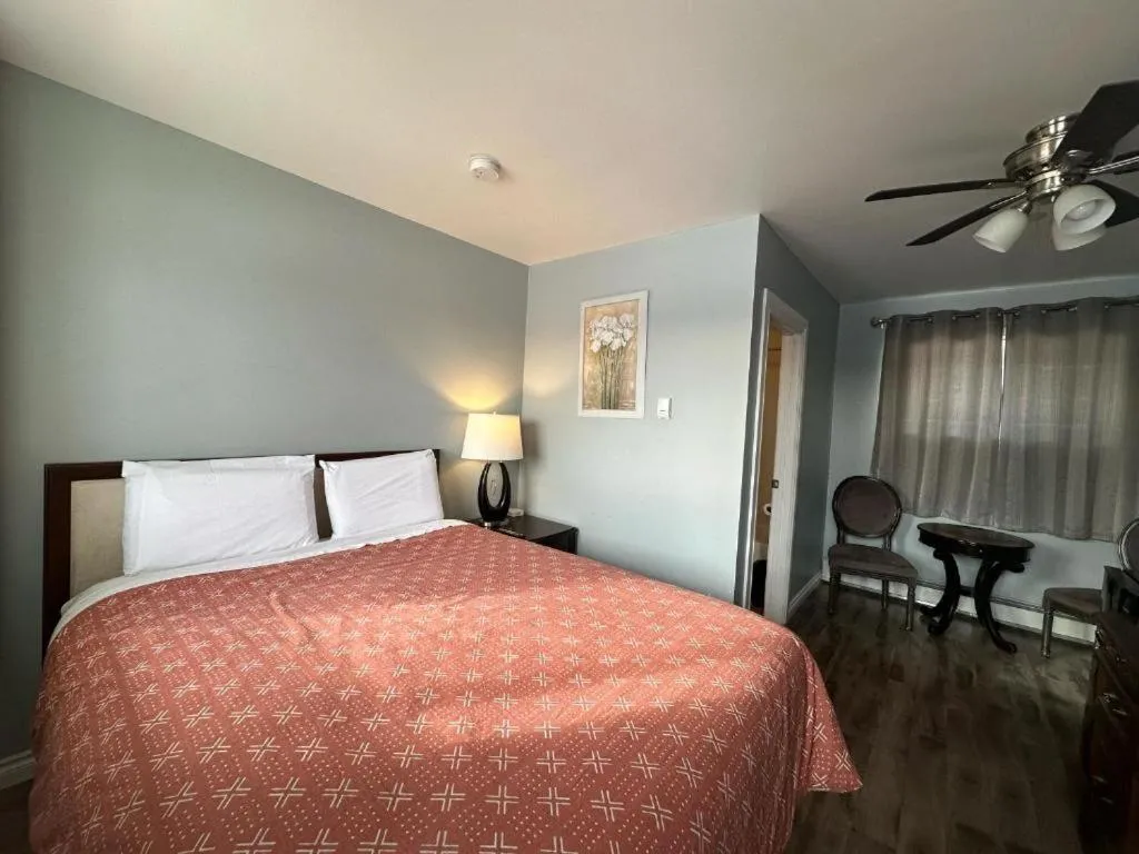 Bed in Town and Country Motel