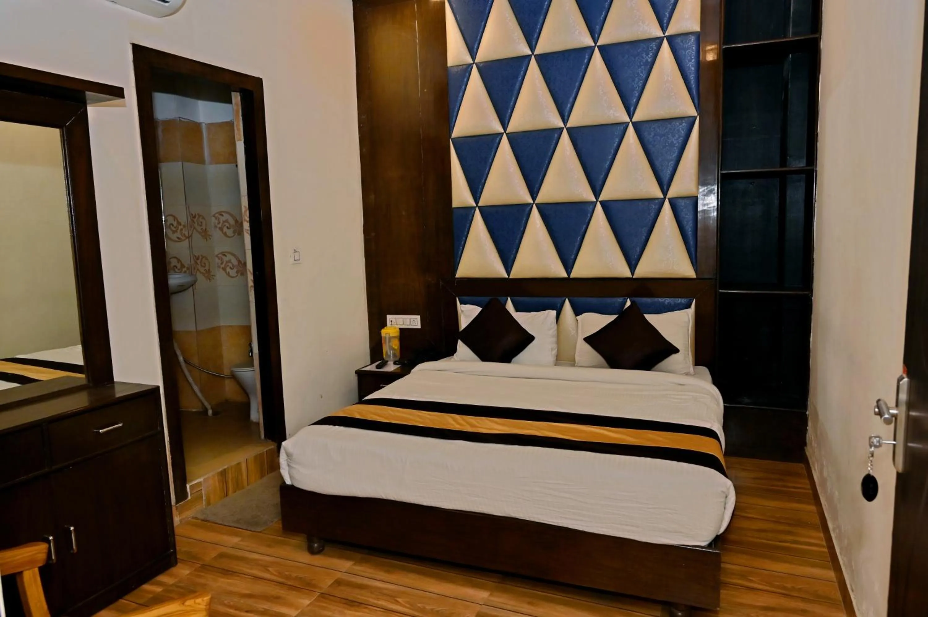 Photo of the whole room, Bed in TRPOTELS Sudarshan