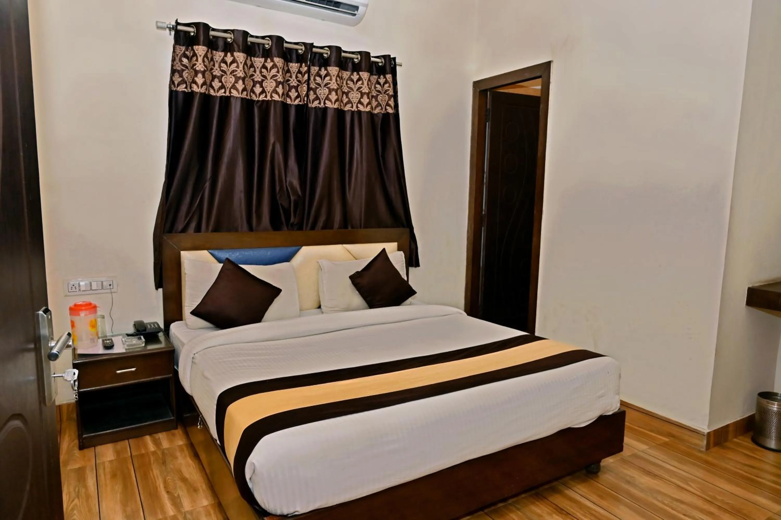 Photo of the whole room, Bed in TRPOTELS Sudarshan