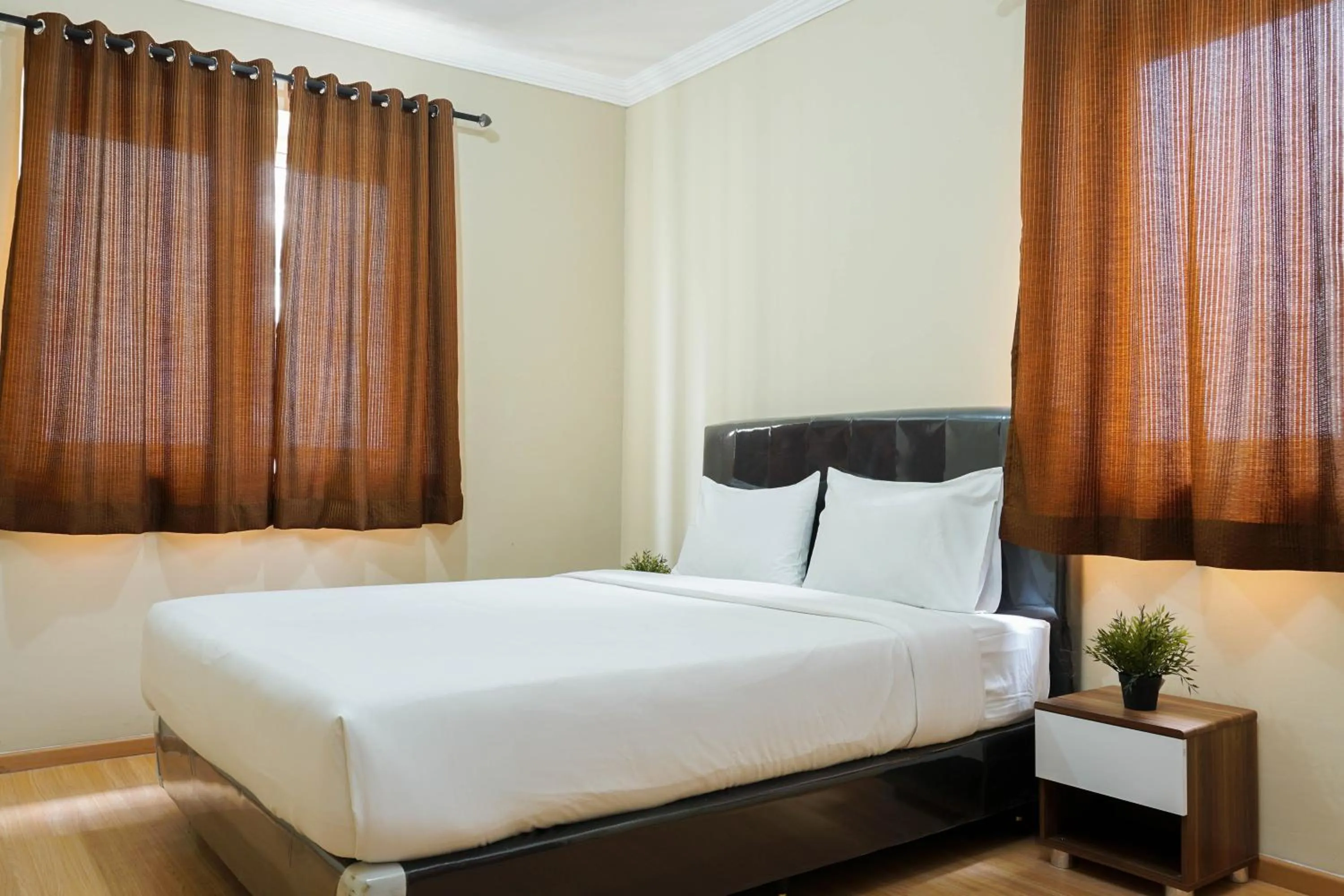 Bed in Spacious 3BR Residence at Grand Palace Kemayoran Apartment By Travelio