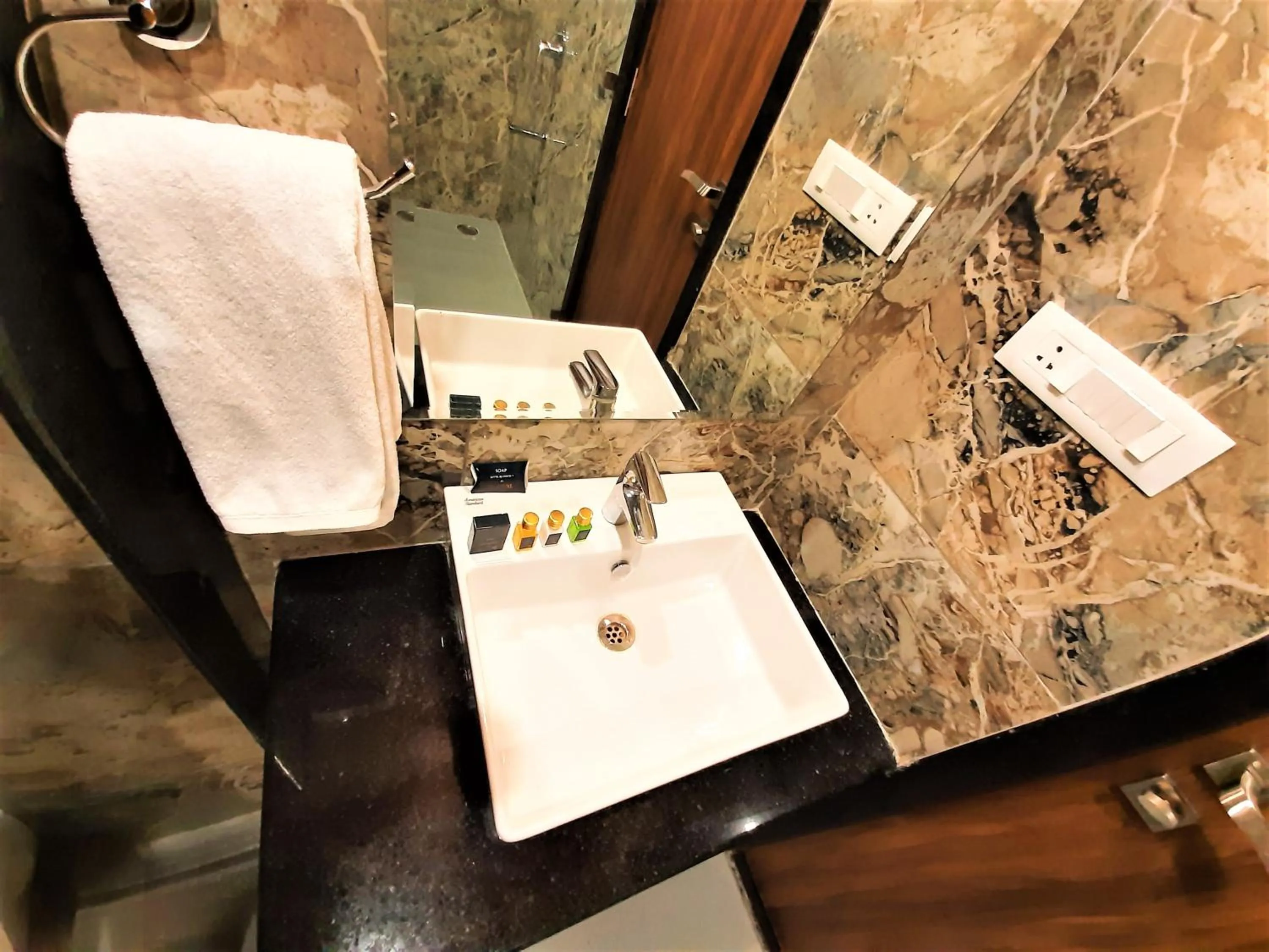 Bathroom in Suvin Residency with Rooftop Swimming Pool