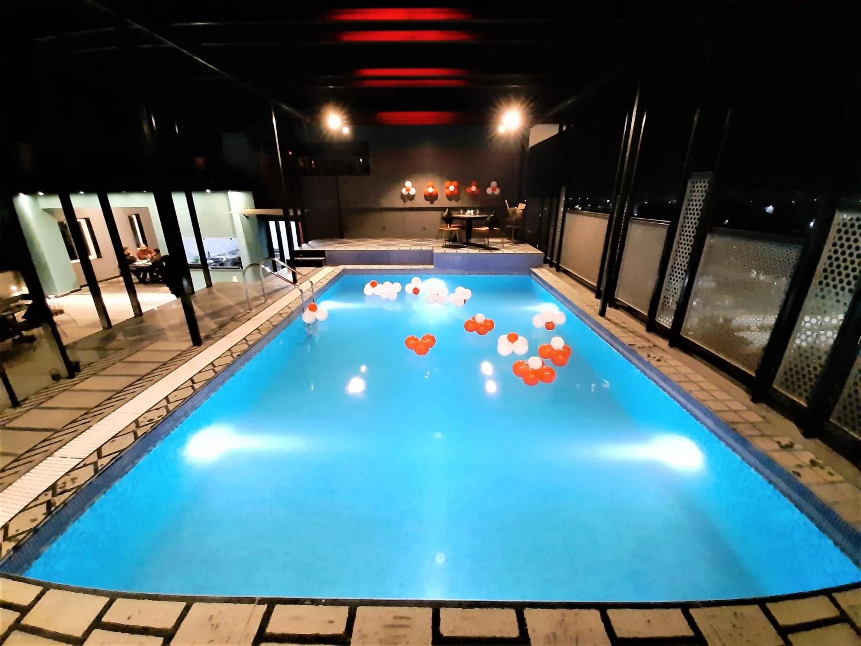 Swimming pool in Suvin Residency with Rooftop Swimming Pool