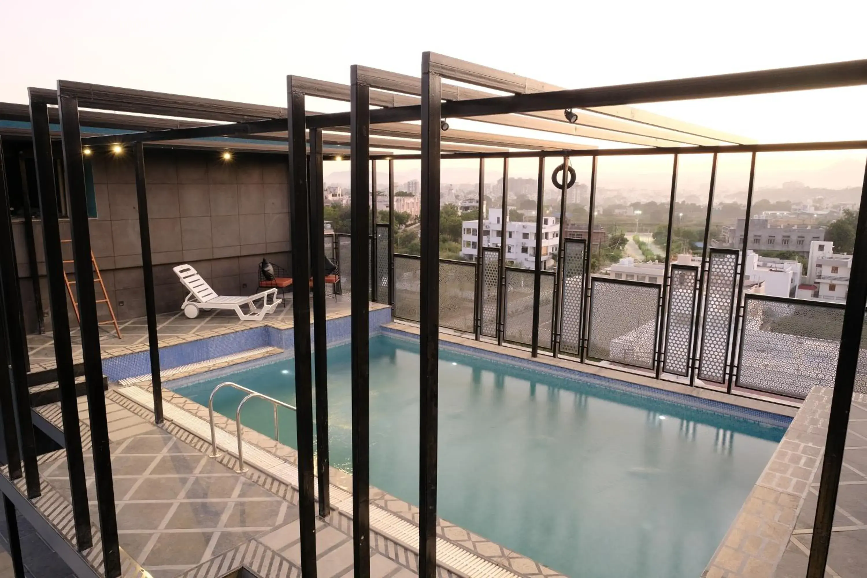 Patio in Suvin Residency with Rooftop Swimming Pool Patio in Suvin Residency with Rooftop Swimming Pool