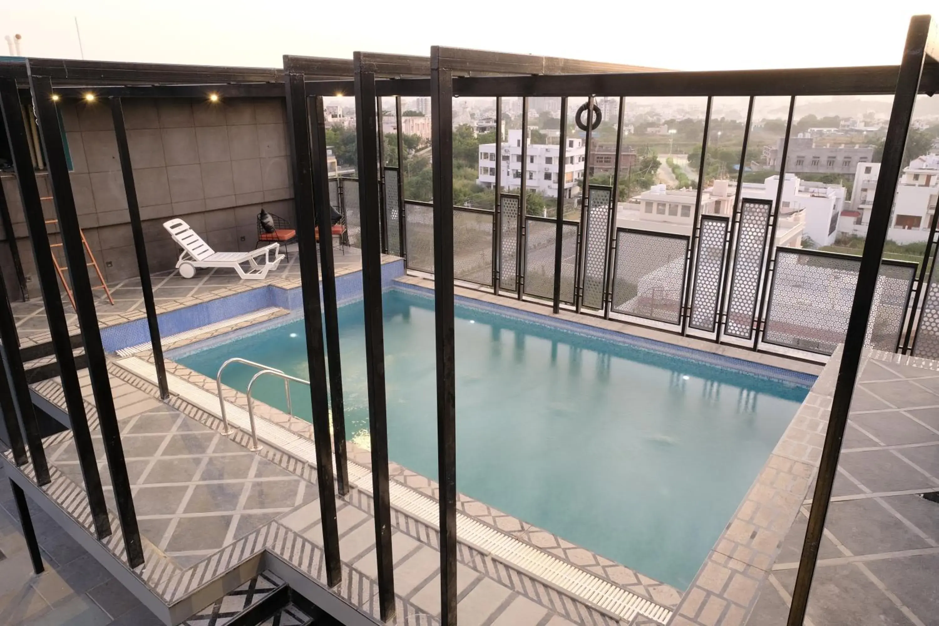 Patio in Suvin Residency with Rooftop Swimming Pool Patio in Suvin Residency with Rooftop Swimming Pool