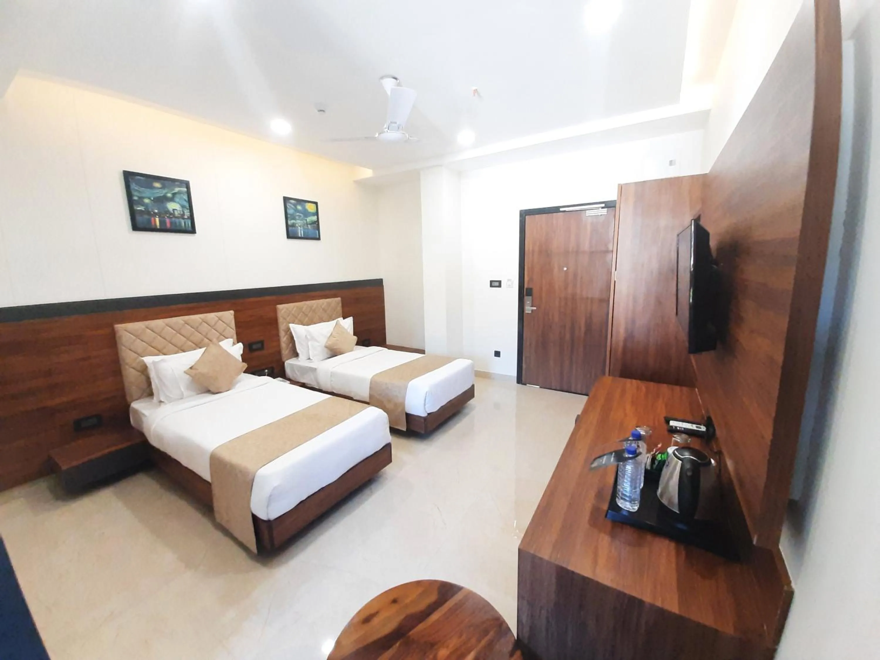 Bed in Suvin Residency with Rooftop Swimming Pool