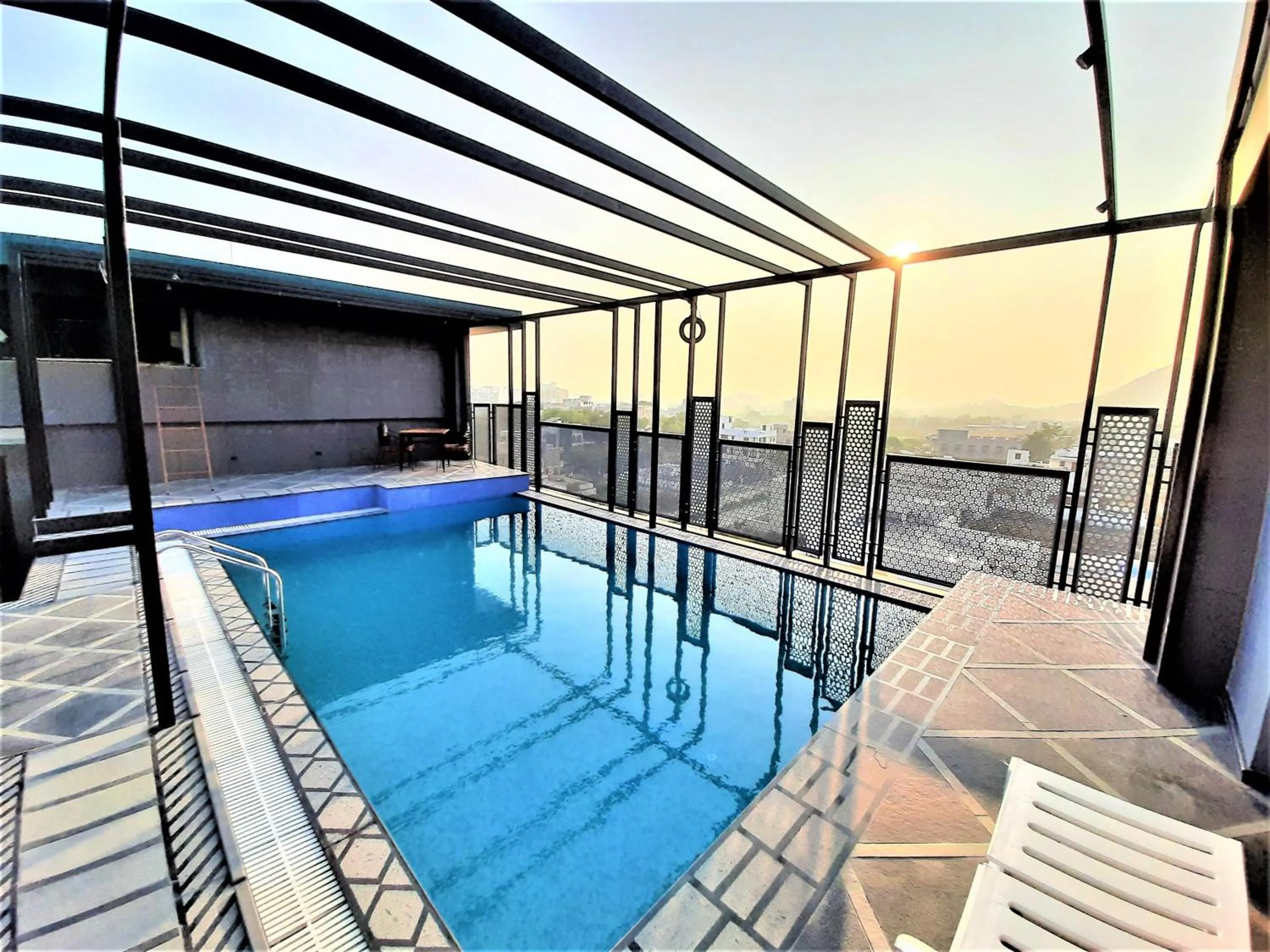 Swimming pool in Suvin Residency with Rooftop Swimming Pool