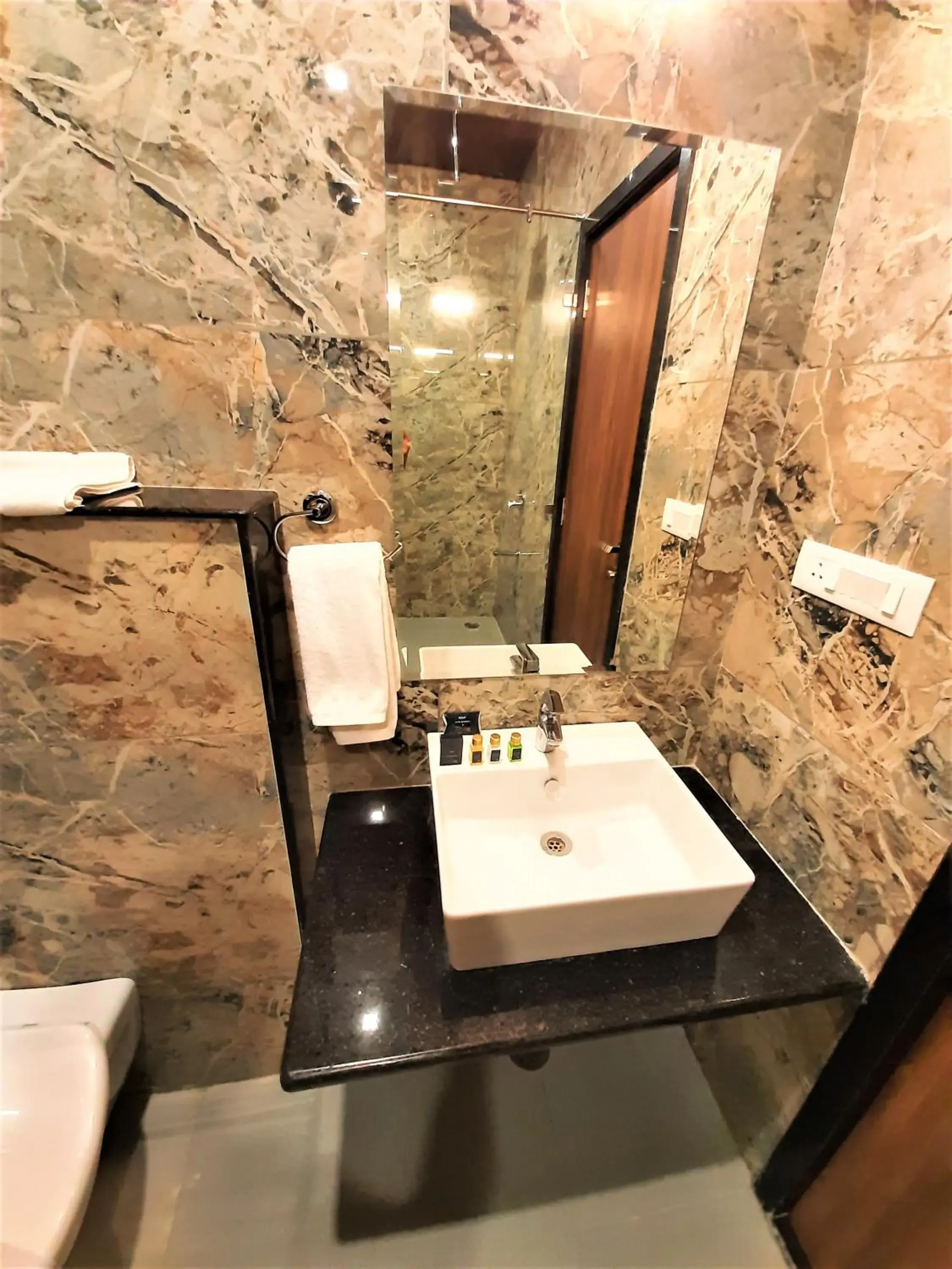 Toilet in Suvin Residency with Rooftop Swimming Pool Toilet in Suvin Residency with Rooftop Swimming Pool