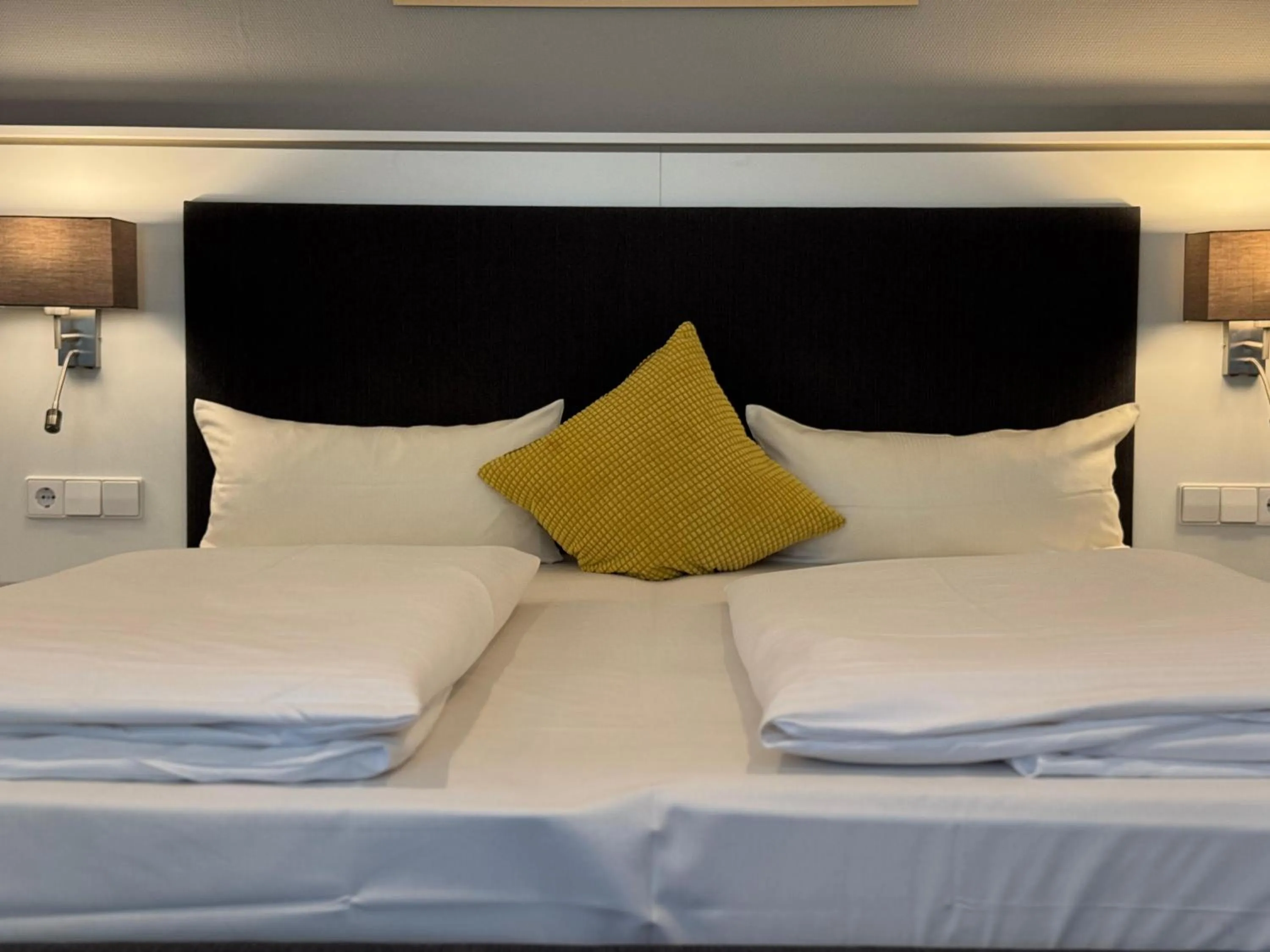 Bed in Mirage City Hotel Stuttgart Zentrum