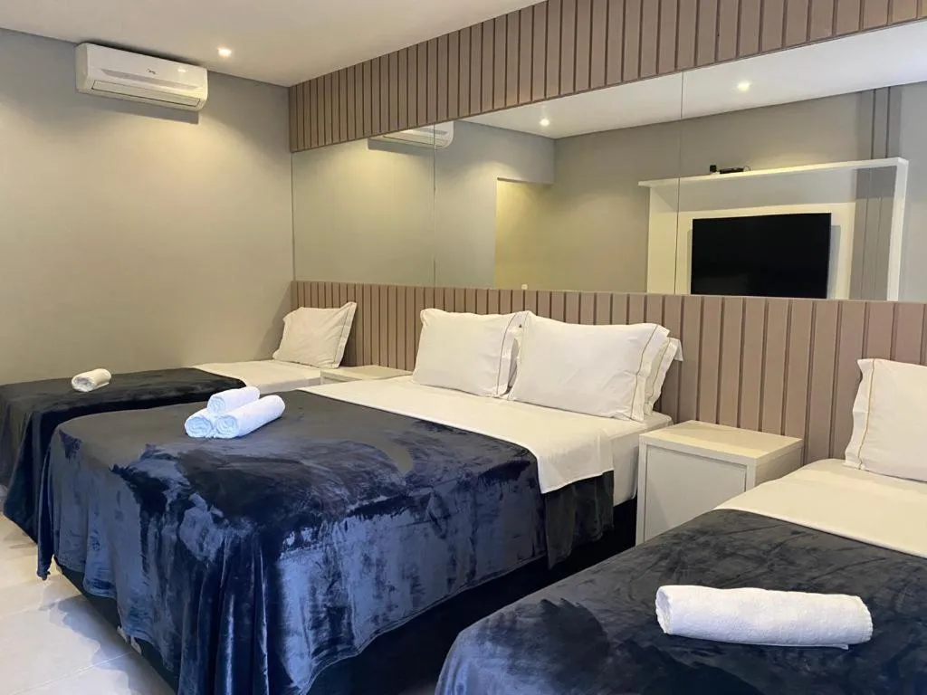 Bed in POUSADA HAPPY DAY PARATY