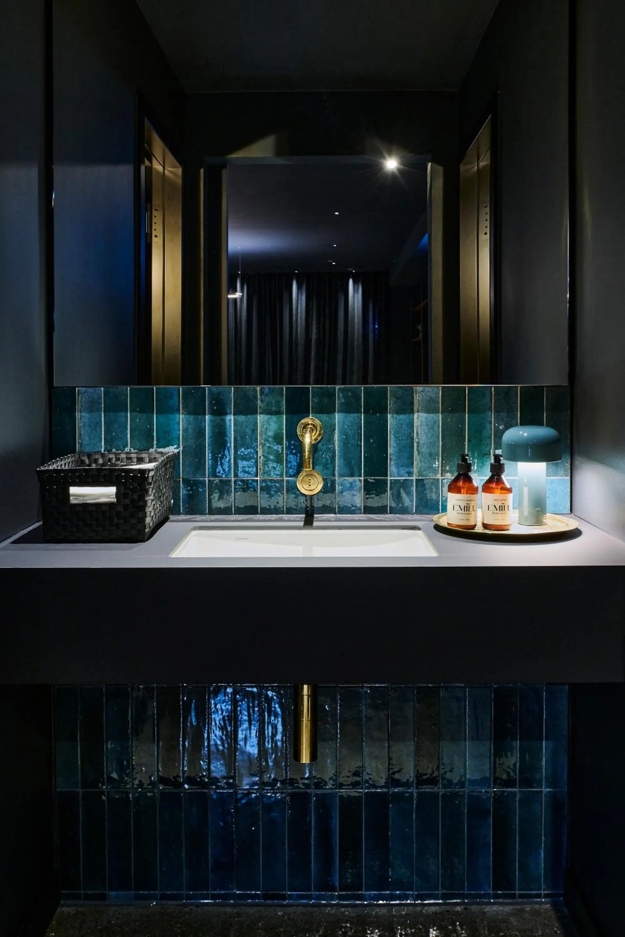 Communal lounge/ TV room in EmiLu Design Hotel