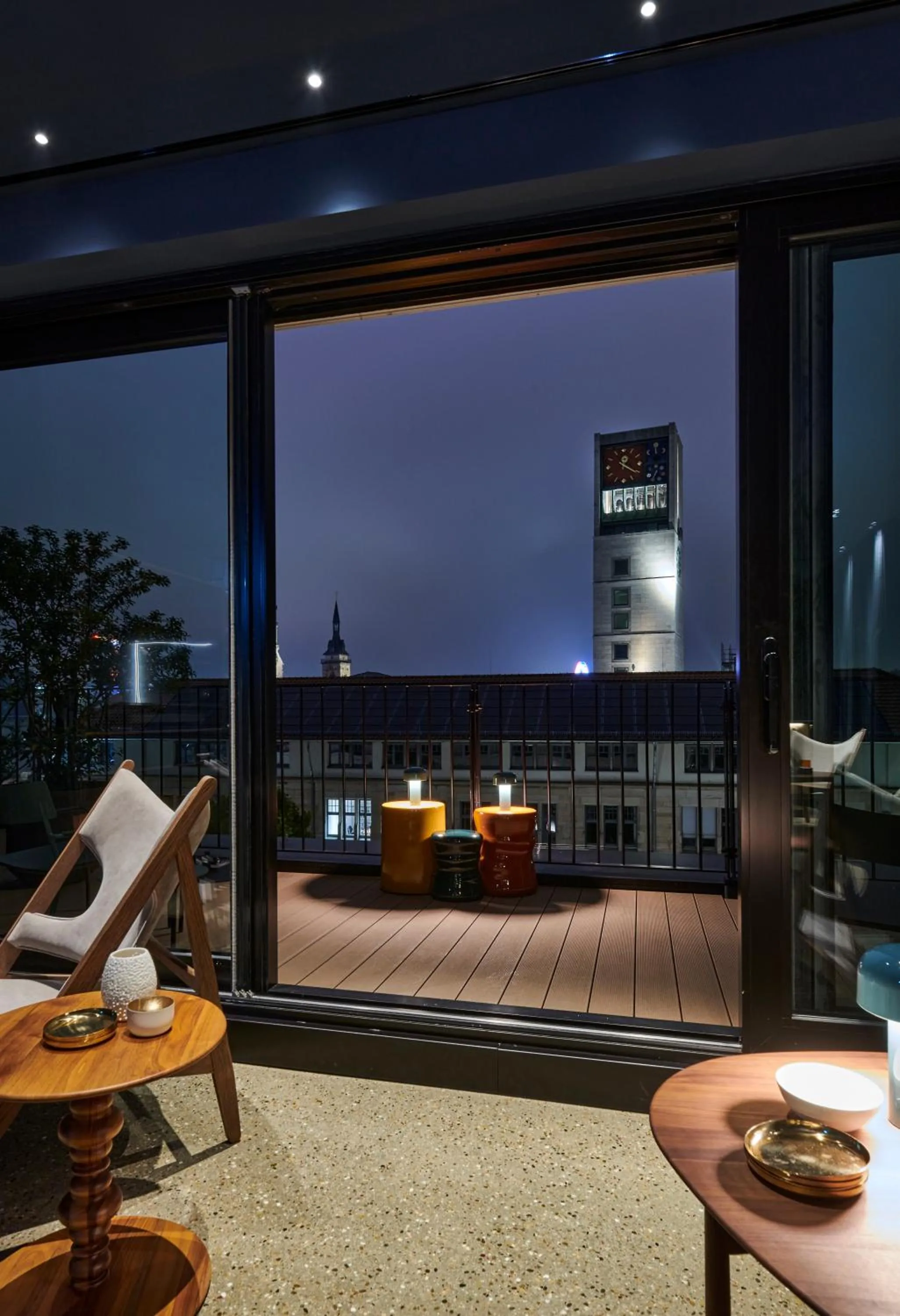 Communal lounge/ TV room in EmiLu Design Hotel