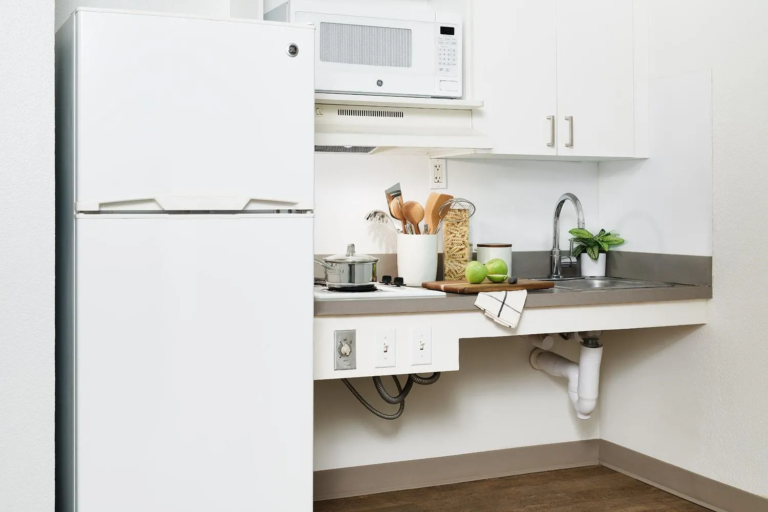 Kitchen or kitchenette in InTown Suites Extended Stay Houston TX - IAH Airport