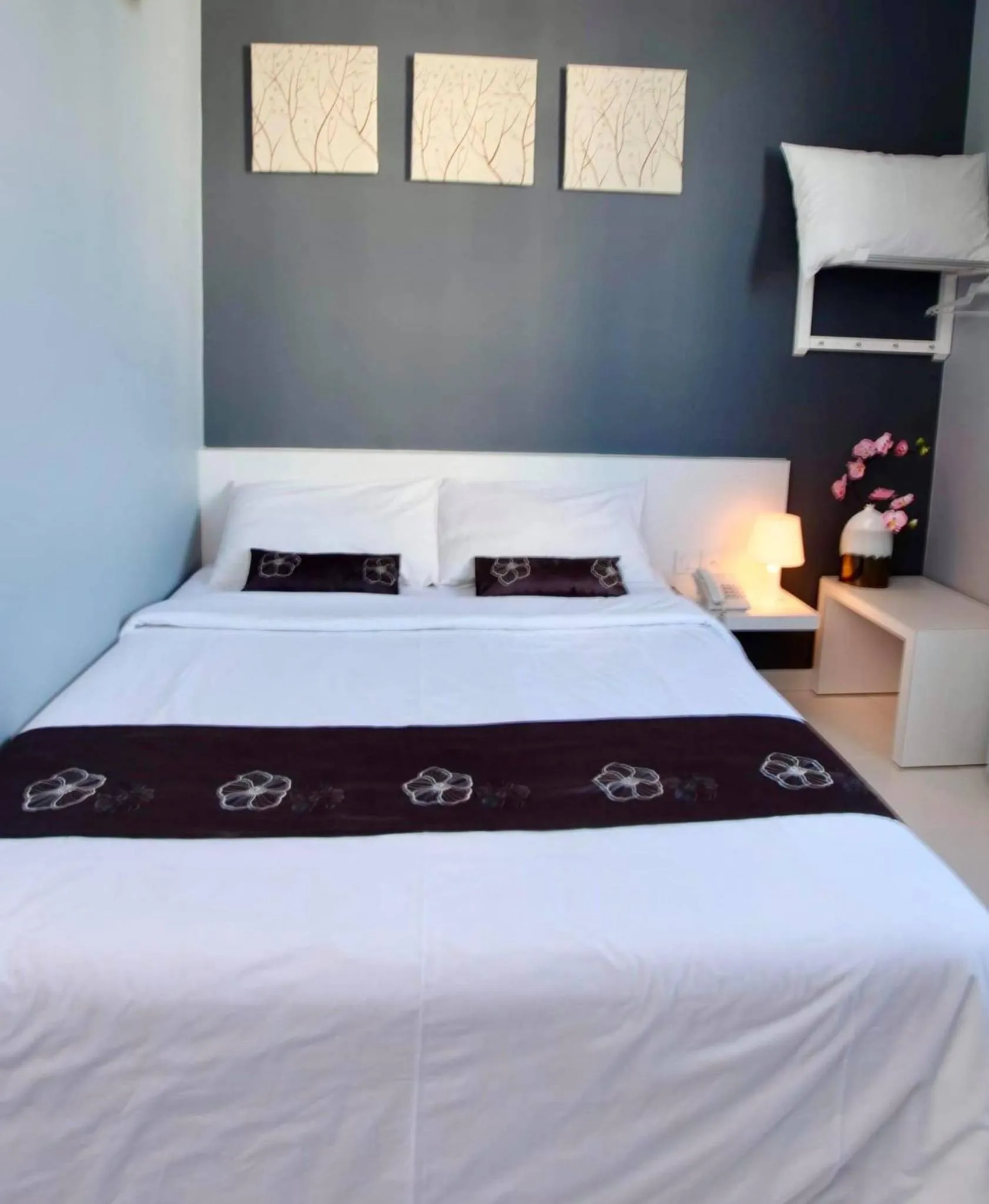 Bed in Wan Loong Hotel