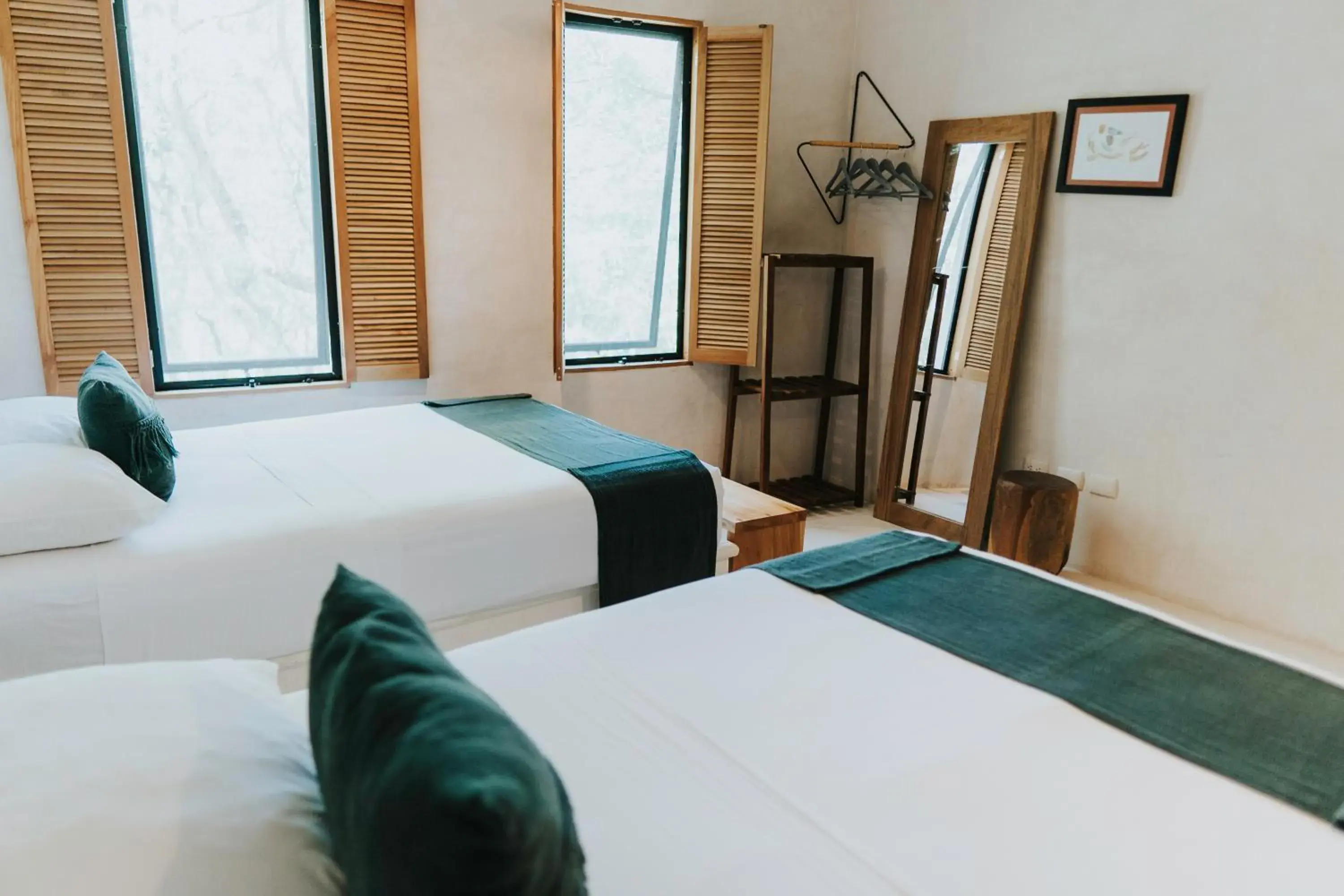 Bed in Koos Tulum Hotel Bed in Koos Tulum Hotel