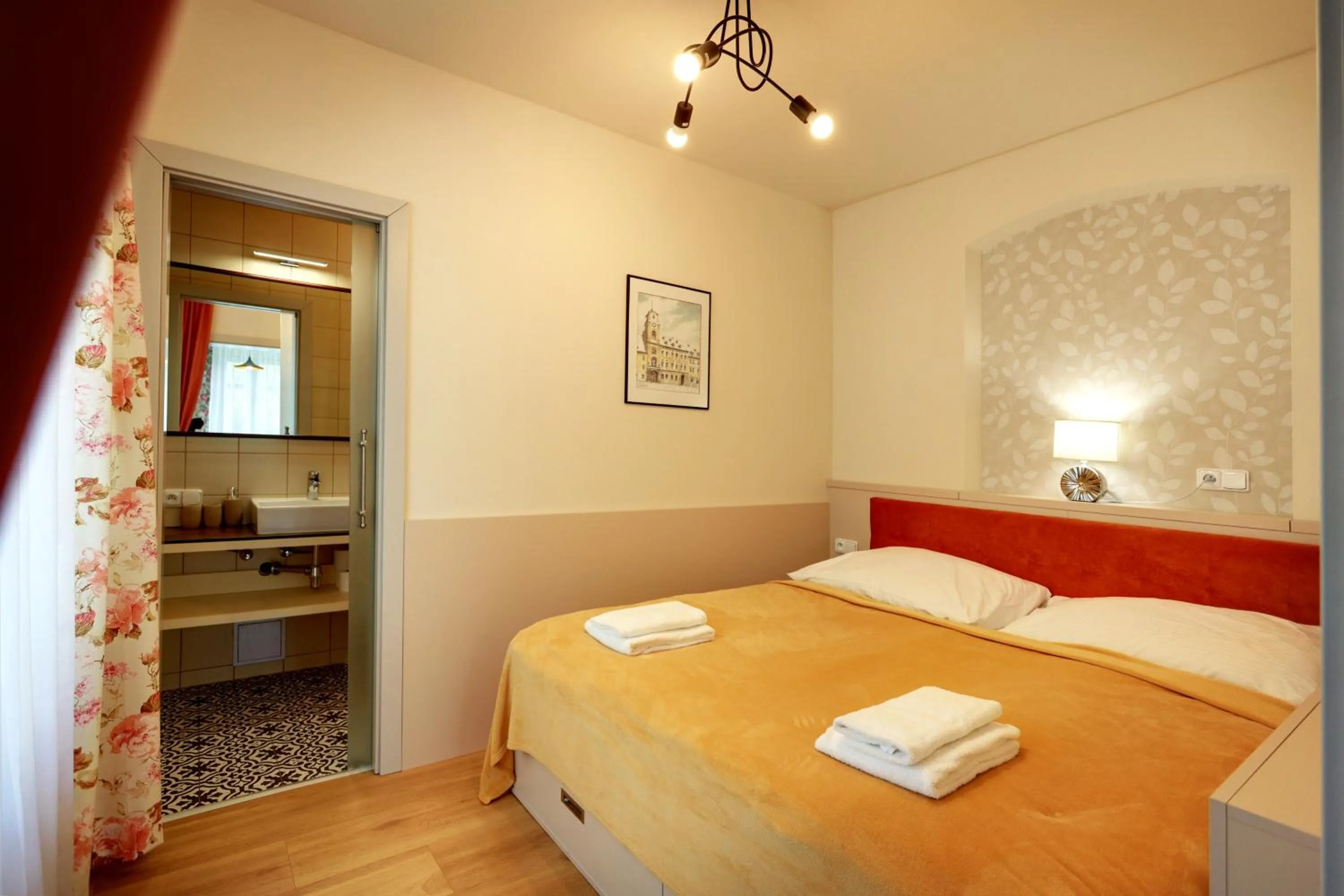 Bed in APARTMÁNY ADAM