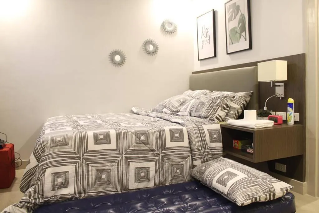 Bed in A2J Luxury BGC Balcony Suite Near SM AURA Taguig
