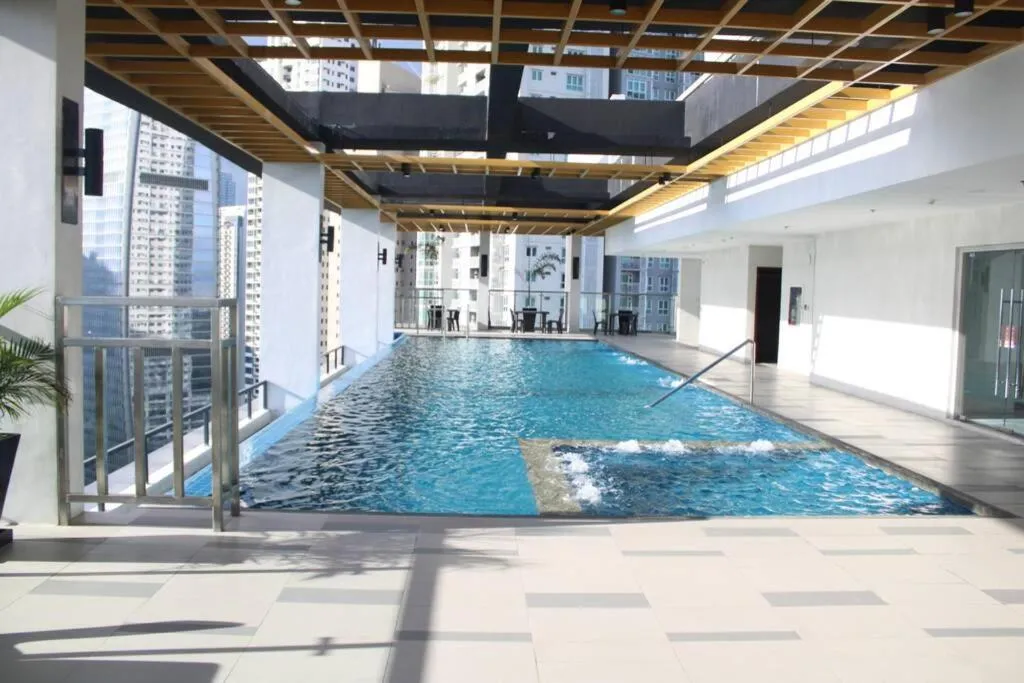Swimming pool in A2J Luxury BGC Balcony Suite Near SM AURA Taguig